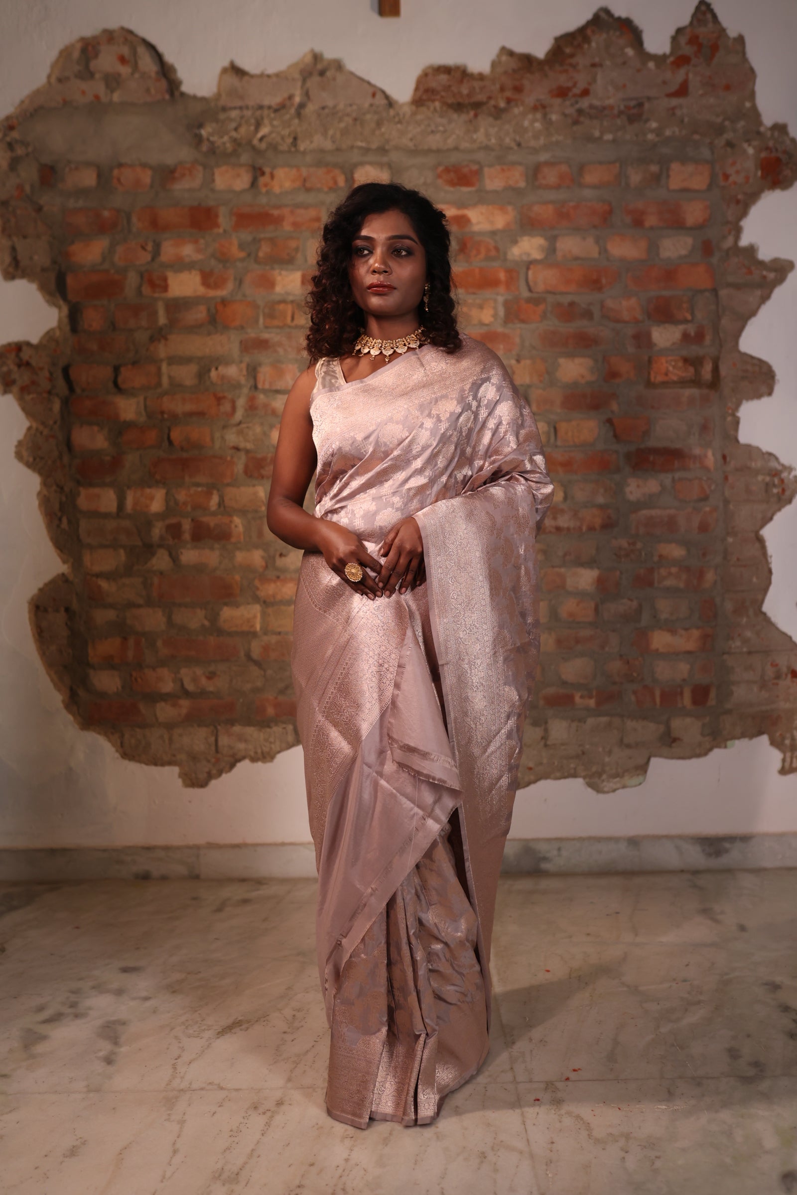 Ananya || Mushroom Grey Pure Katan Banarasi Saree with all over Floral Jaal woven in Matte Copper Zari