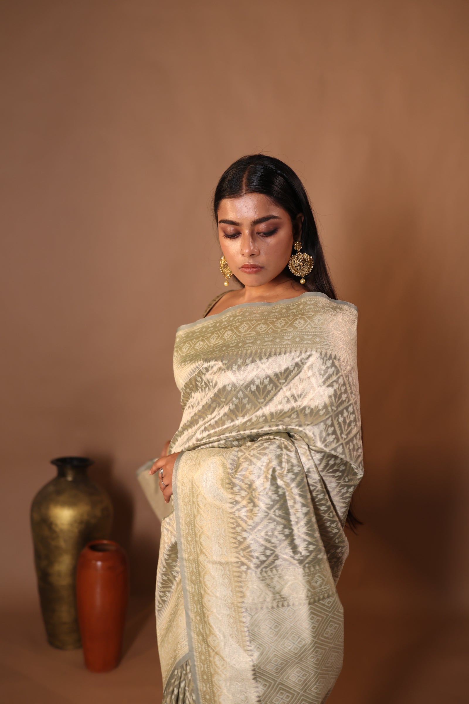 Komal || Metallic Ash Chanderi Katan Tissue Banarasi Saree with all over Leaf motif Buta & Jaal woven in Matte Gold Zari