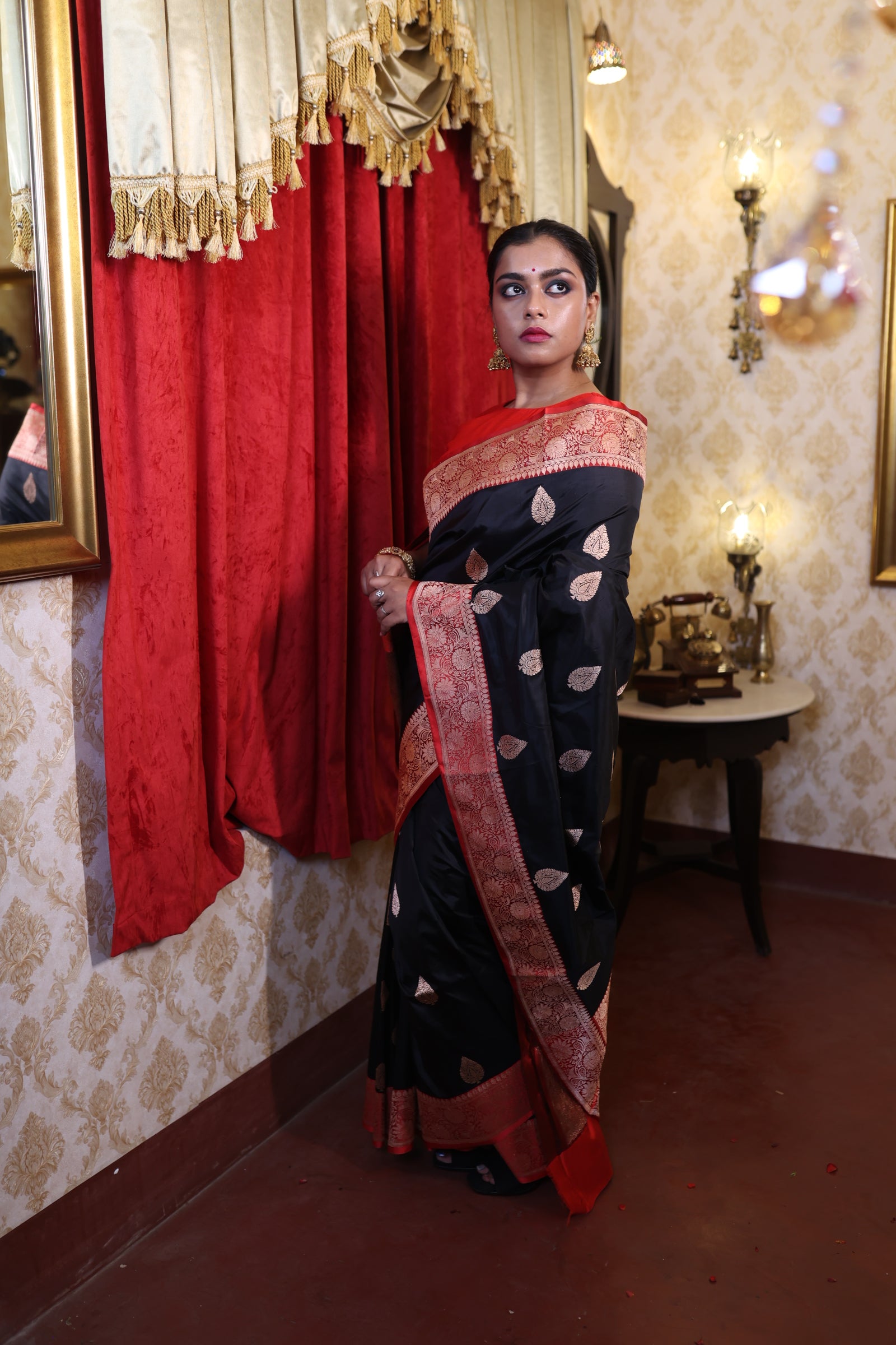 Kamini || Black Pure Katan Handloom Banarasi Saree with all over Copper Zari Kadhua Buta and Red border