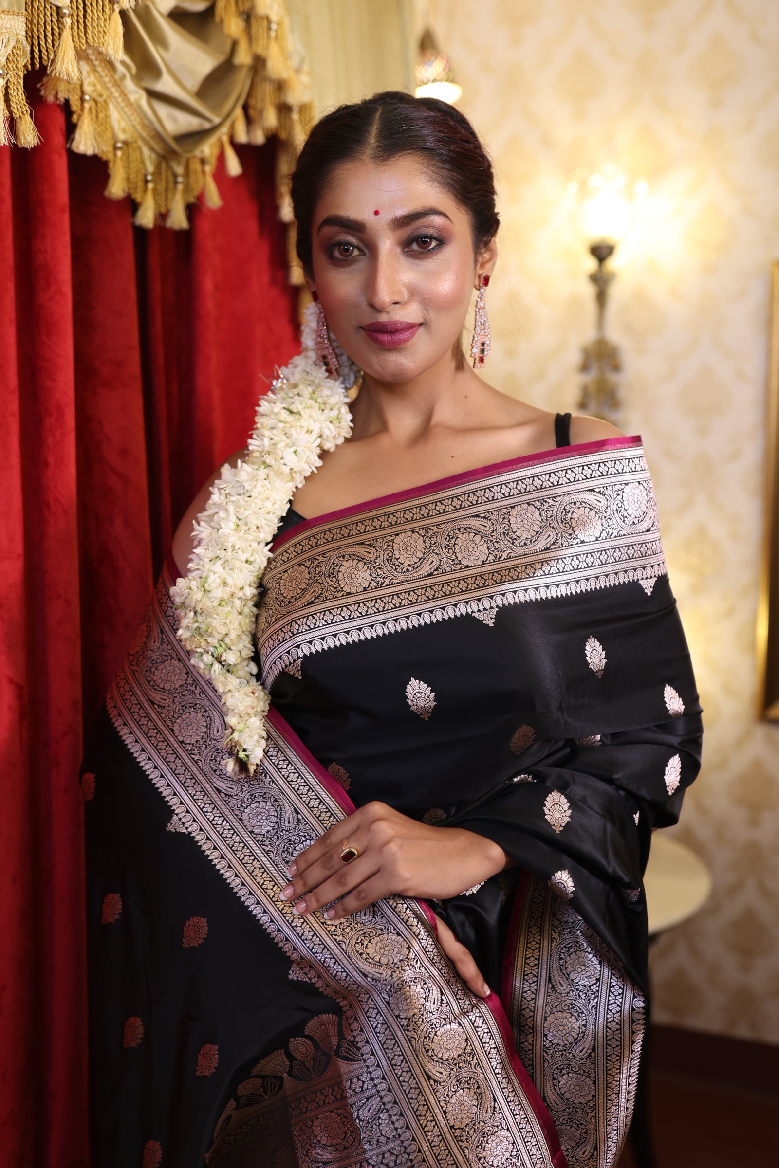 Kajri || Black Banarasi Mashru Silk Banarasi Saree with all over Copper Zari Buta and sleek Magenta border