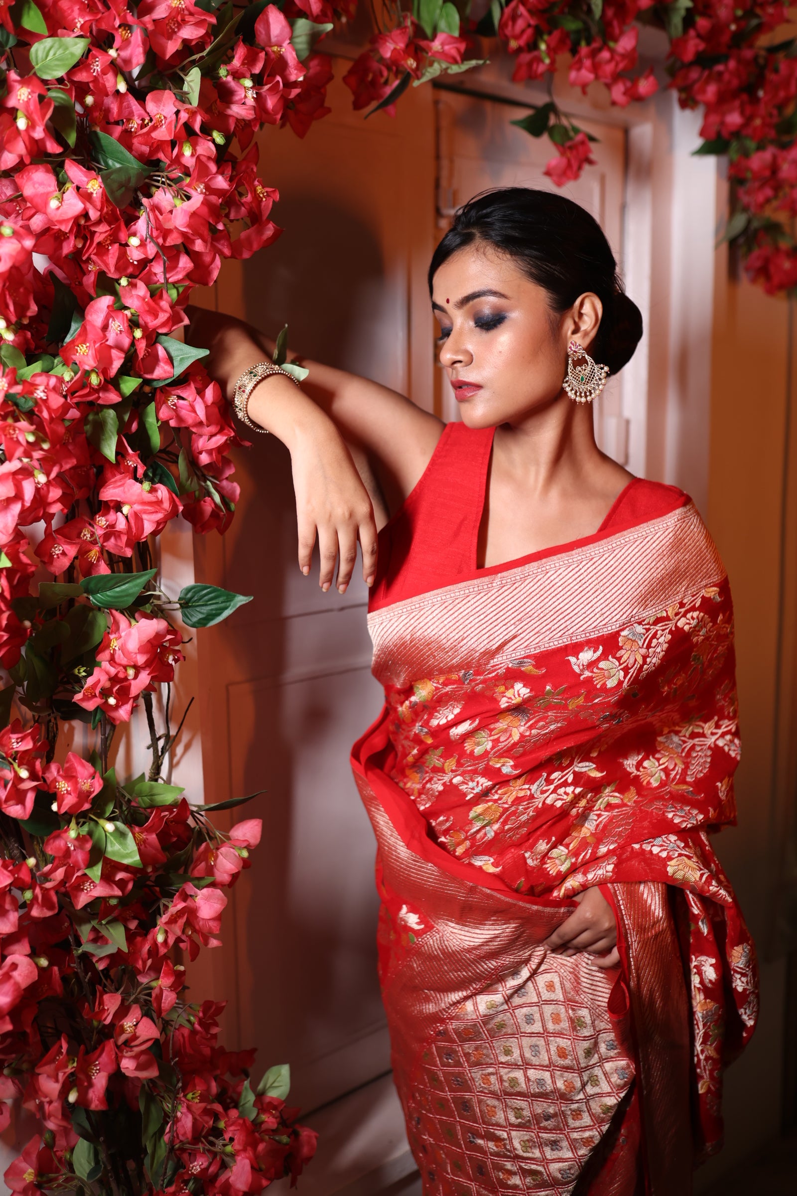 Mohini || Bright Red Khaddi Georgette Banarasi Saree with all over Rifling Handbrush Multi-colour & Matte Gold Zari Floral motif and Jaal