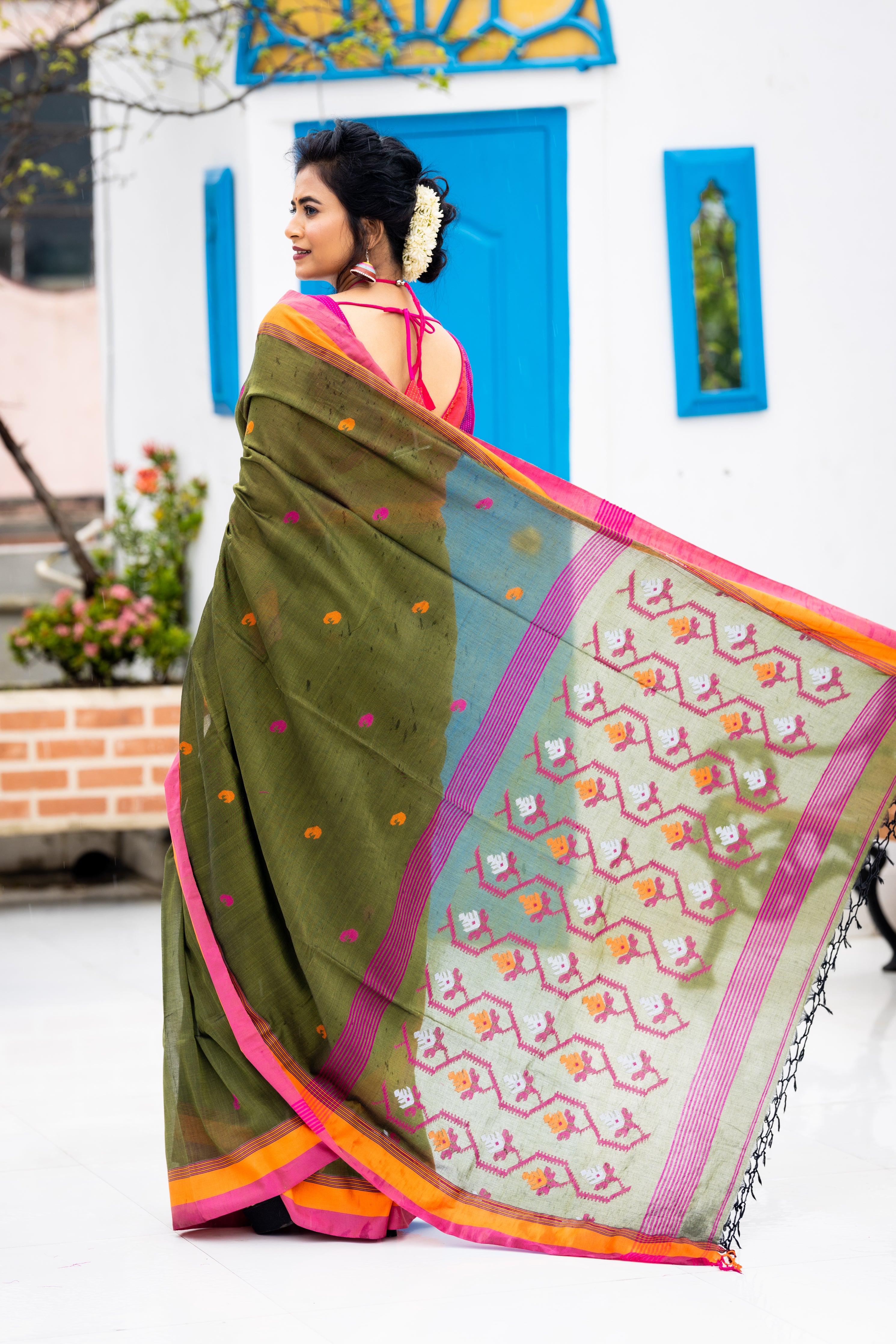 Tamalika || Dark Moss Green Cotton Bengal Handloom Saree with Half Body Plain, Half body Multi-colour Buta, Jamdani Pallu and Orange & Light Onion Pink border