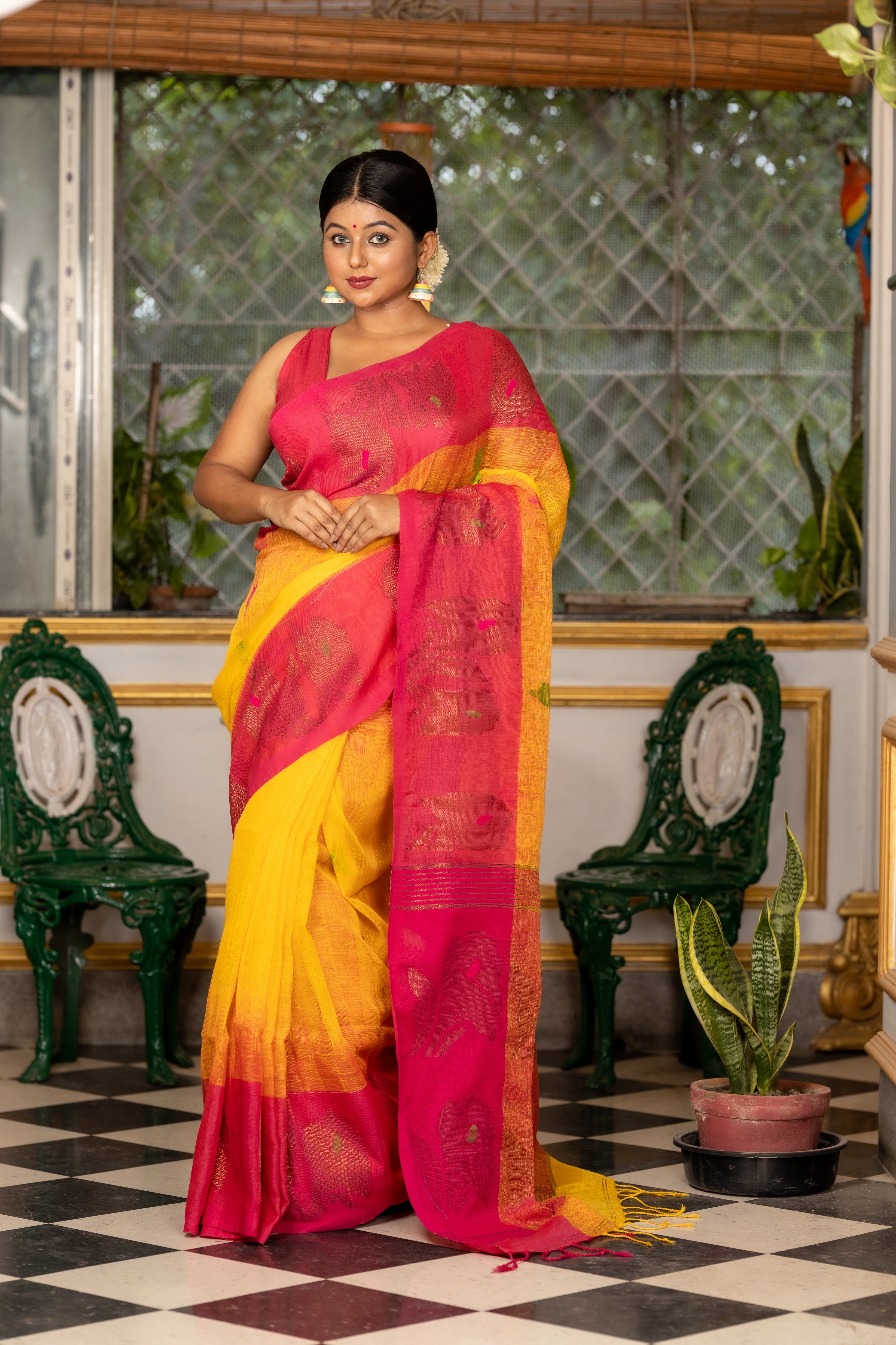 Haridra || Sunflower Yellow Linen Bengal Handloom Saree with all over Multi-colour Buta, Magenta 'Mahapadh' & Antique Gold Zari 'Small Hibiscus' motif Border and Pallu