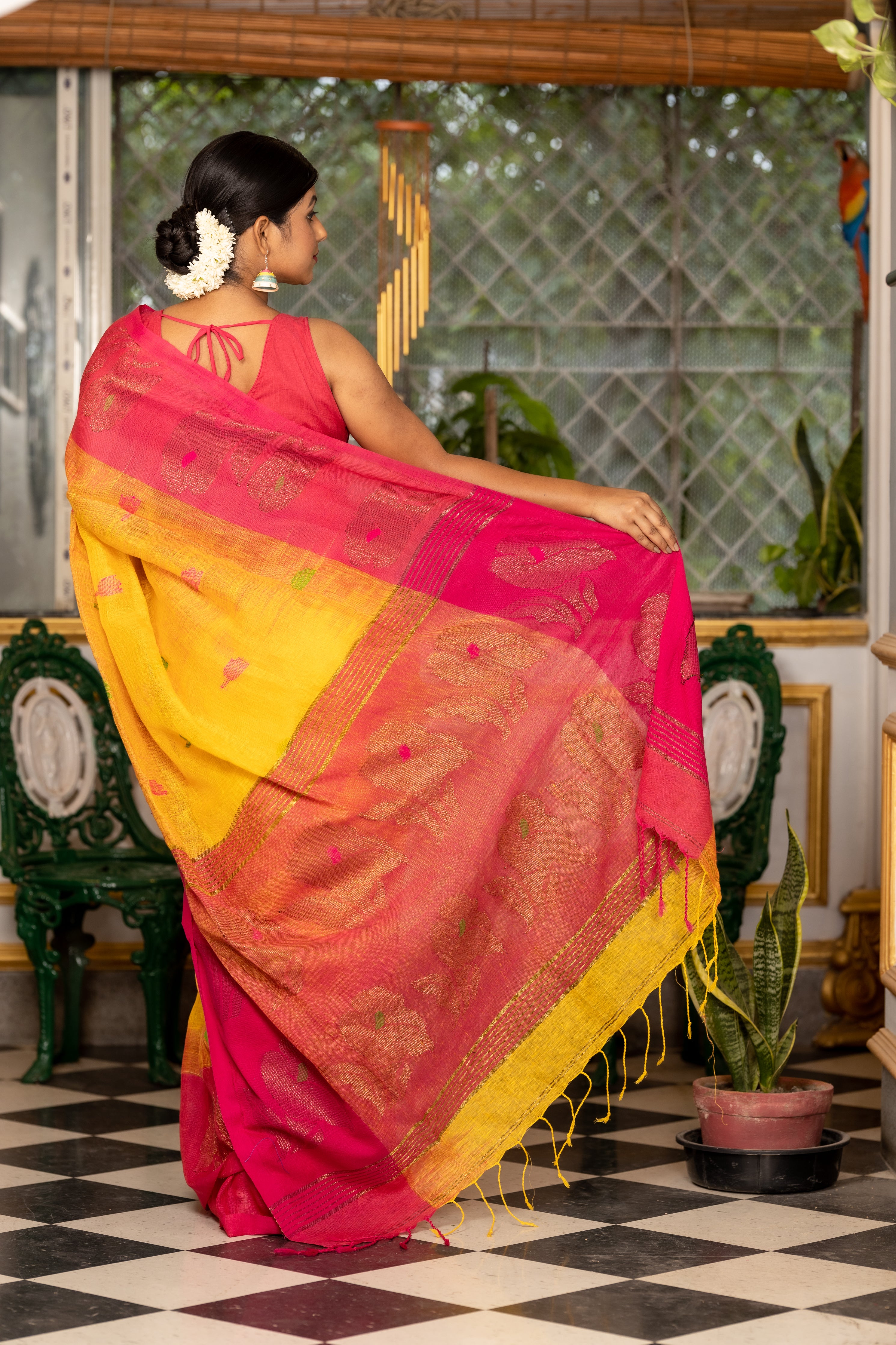 Haridra || Sunflower Yellow Linen Bengal Handloom Saree with all over Multi-colour Buta, Magenta 'Mahapadh' & Antique Gold Zari 'Small Hibiscus' motif Border and Pallu