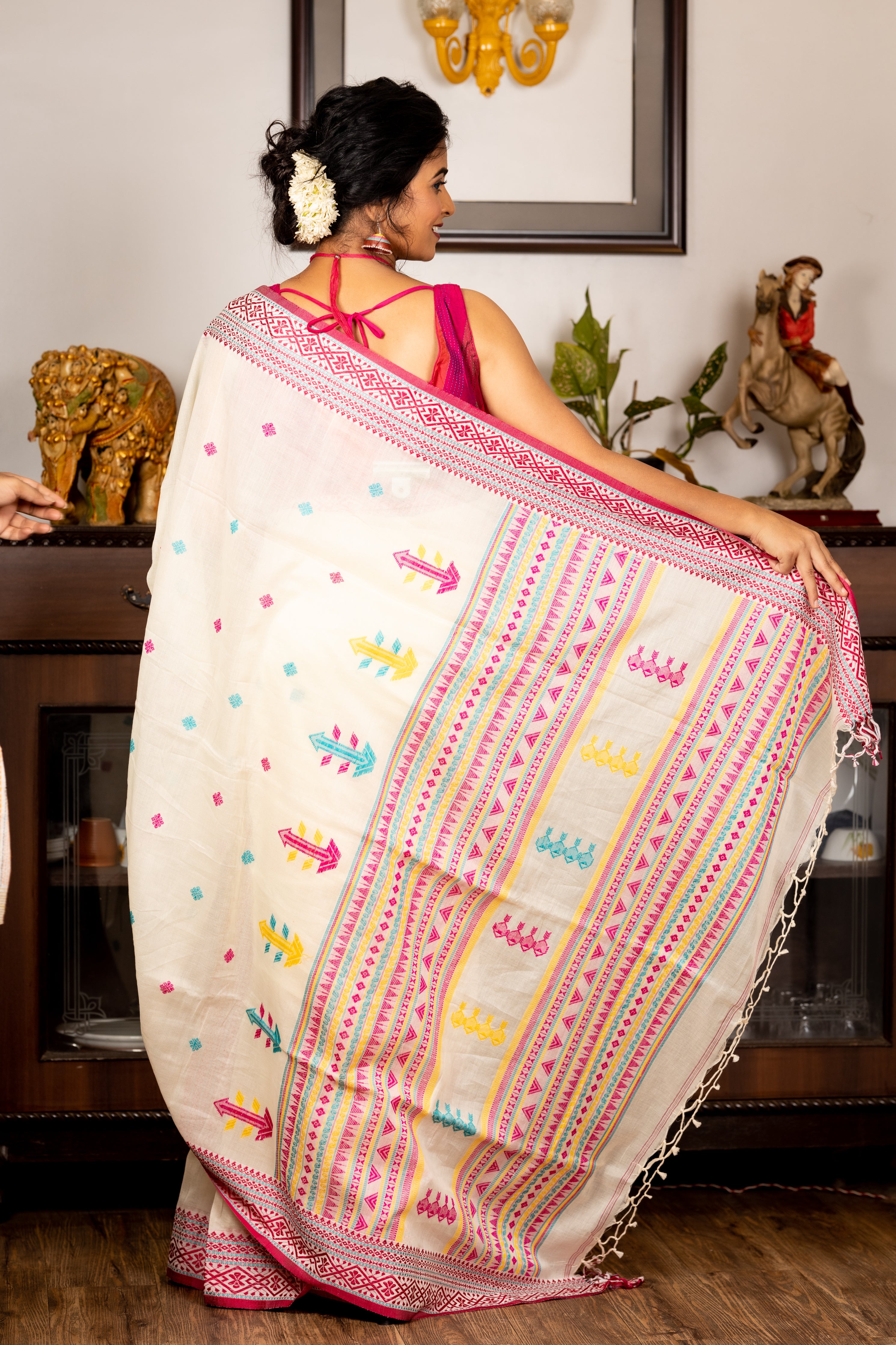 Indira || Off-White Cotton Bengal Handloom Saree with all over Multi-colour Buti, Stripe Pallu and Beetroot Pink Traditional design Border