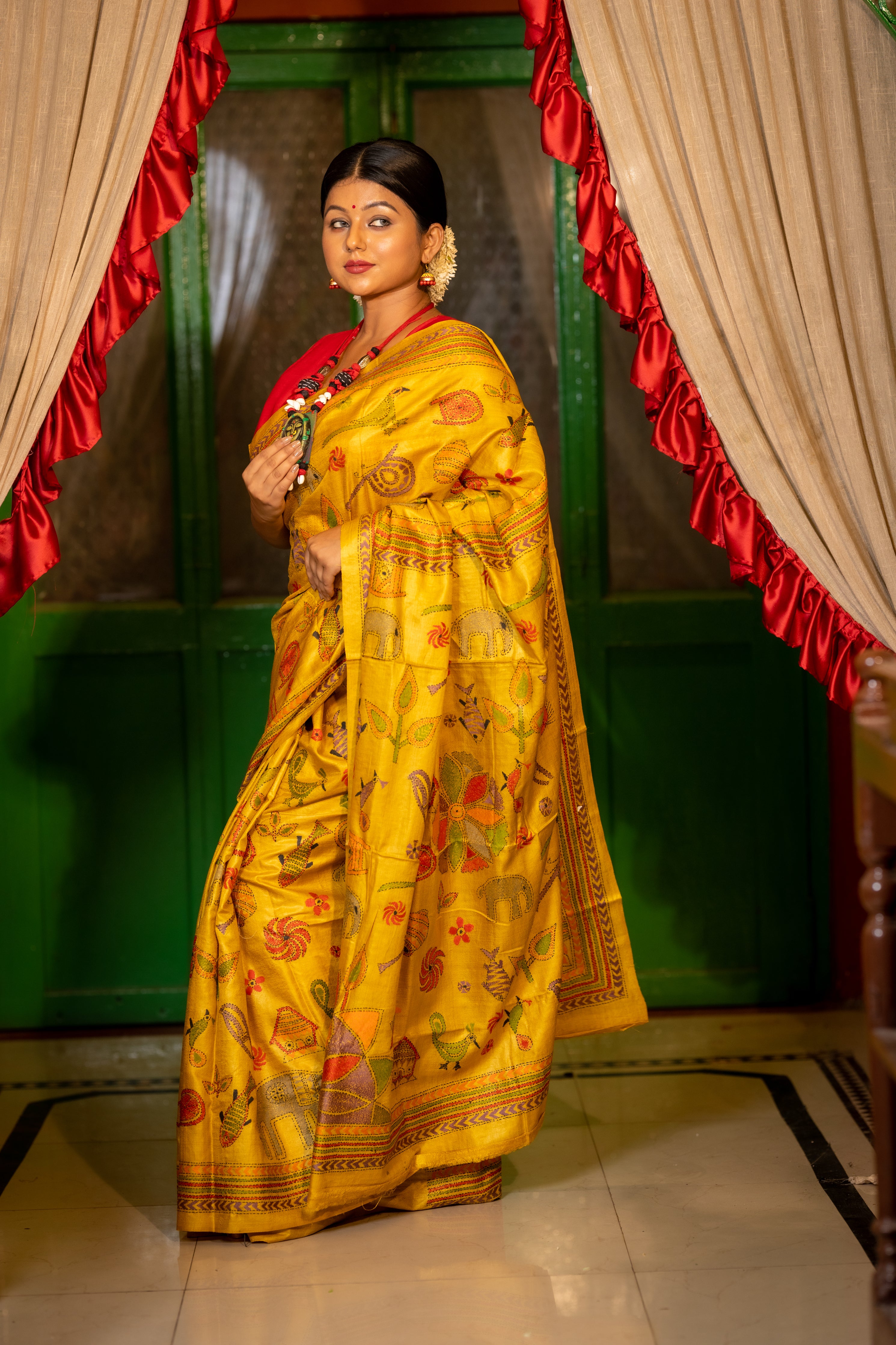 Chitrangada || Ochre Yellow Pure Gachhi Tussar Silk Handloom Kantha Stitch Embroidery Saree with all over Multi-colour Mixed 'Tribal Art' motifs