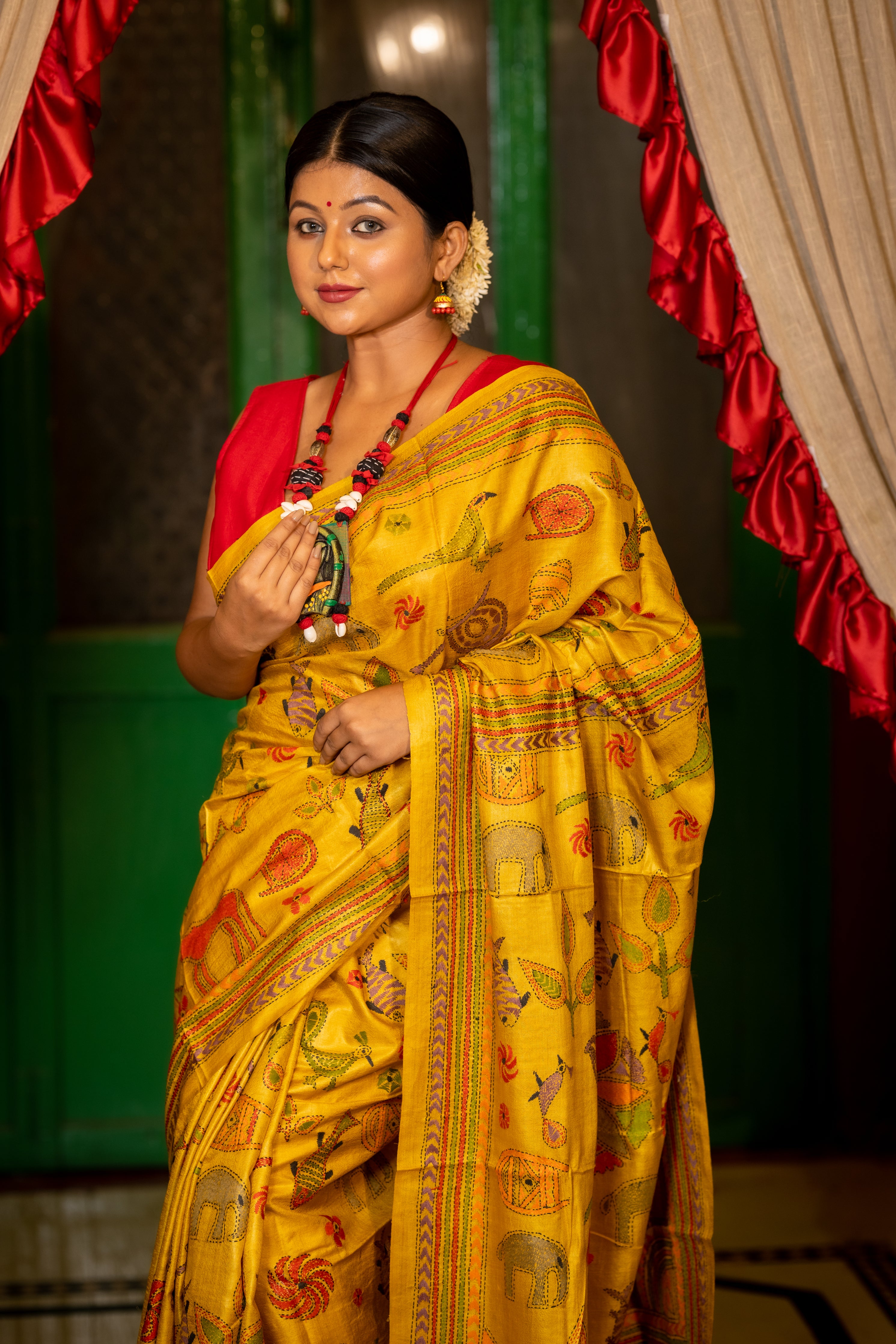 Chitrangada || Ochre Yellow Pure Gachhi Tussar Silk Handloom Kantha Stitch Embroidery Saree with all over Multi-colour Mixed 'Tribal Art' motifs