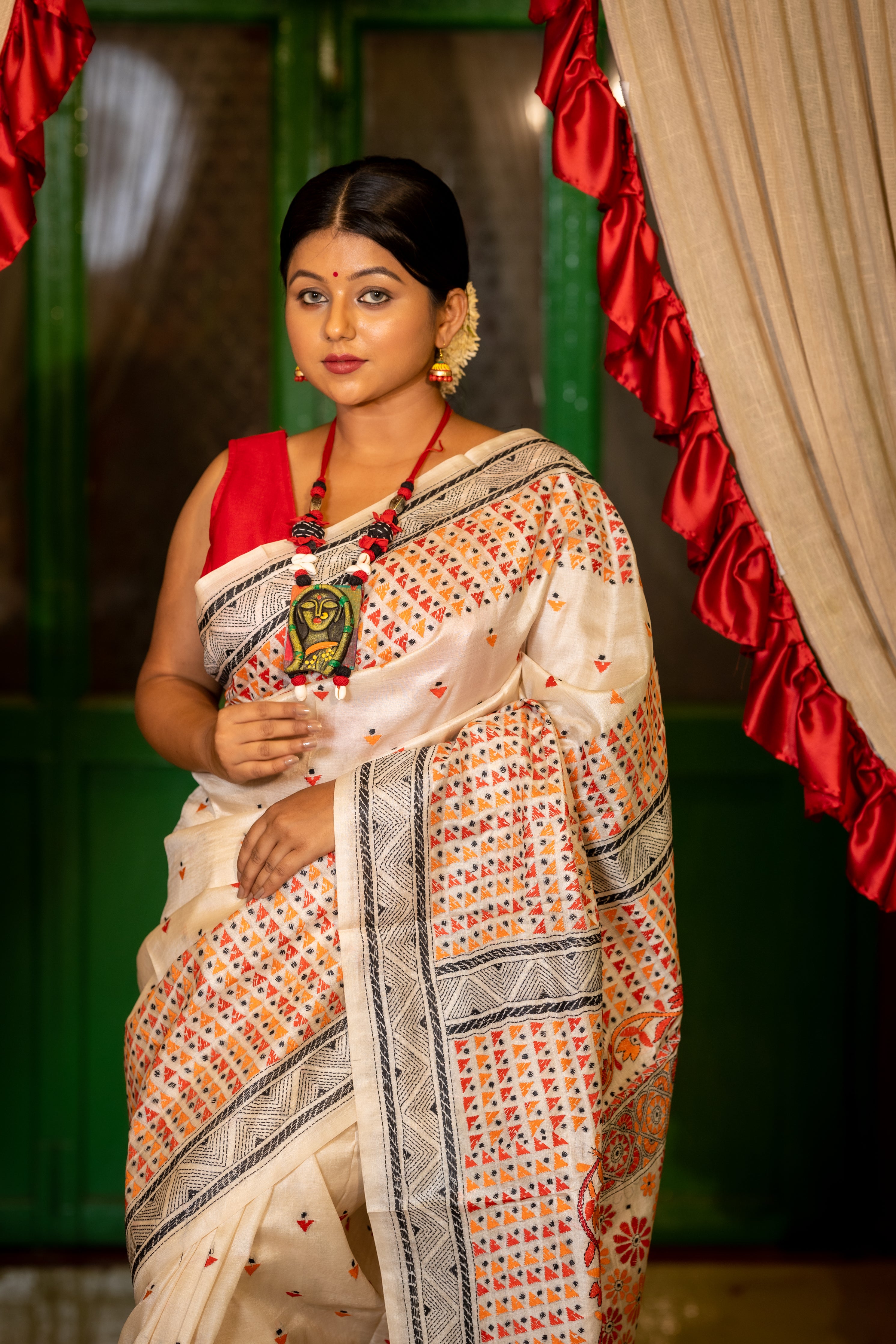 Ushoshi || Off-White Pure Tussar Silk Handloom Kantha Stitch Embroidery Saree with all over Orange, Red & Black Resham Buta, Broad Abstract Border and Floral motif Pallu