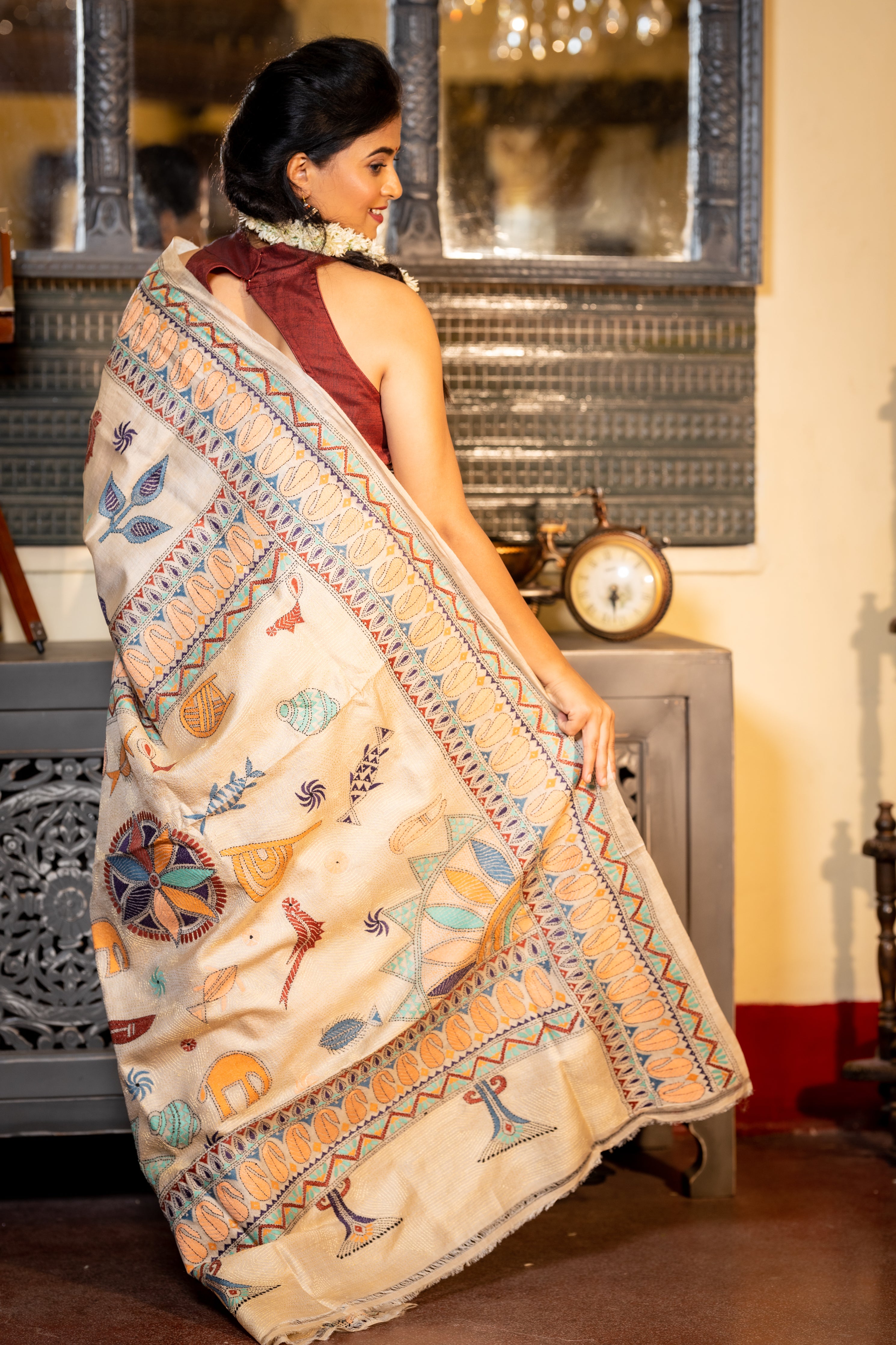 Mrittika || Light Beige Pure Gachhi Tussar Silk Handloom Kantha Stitch Embroidery Saree with all over Multi-colour Mixed Tribal Art motifs and Golden Resham highlights Pallu