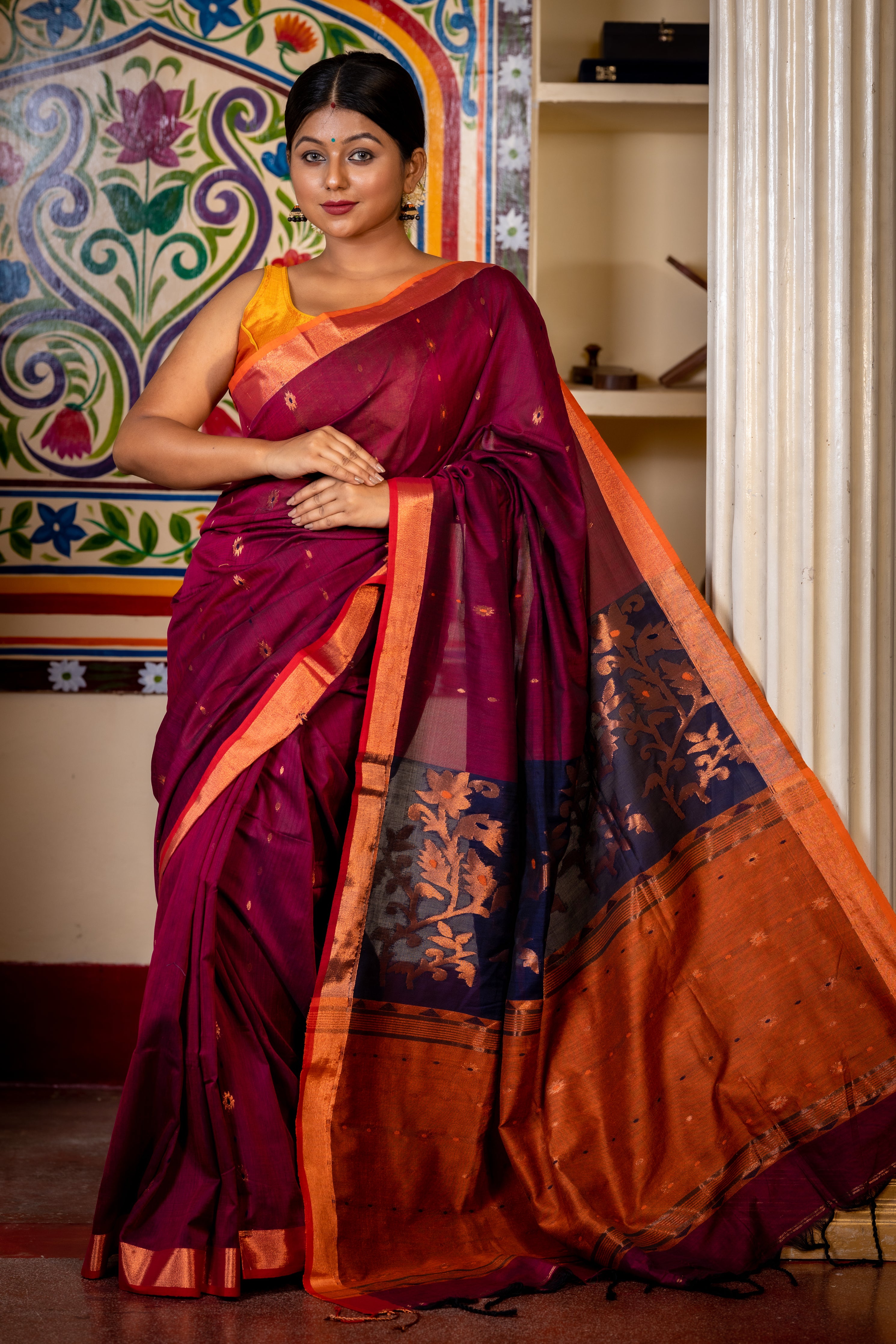 Jamuni || Wine Cotton Bengal Handloom Saree with all over Copper Zari & Multi-colour Buti, Navy Blue & Rust Orange Colour block with Copper Zari Floral motif Pallu and Plain Border