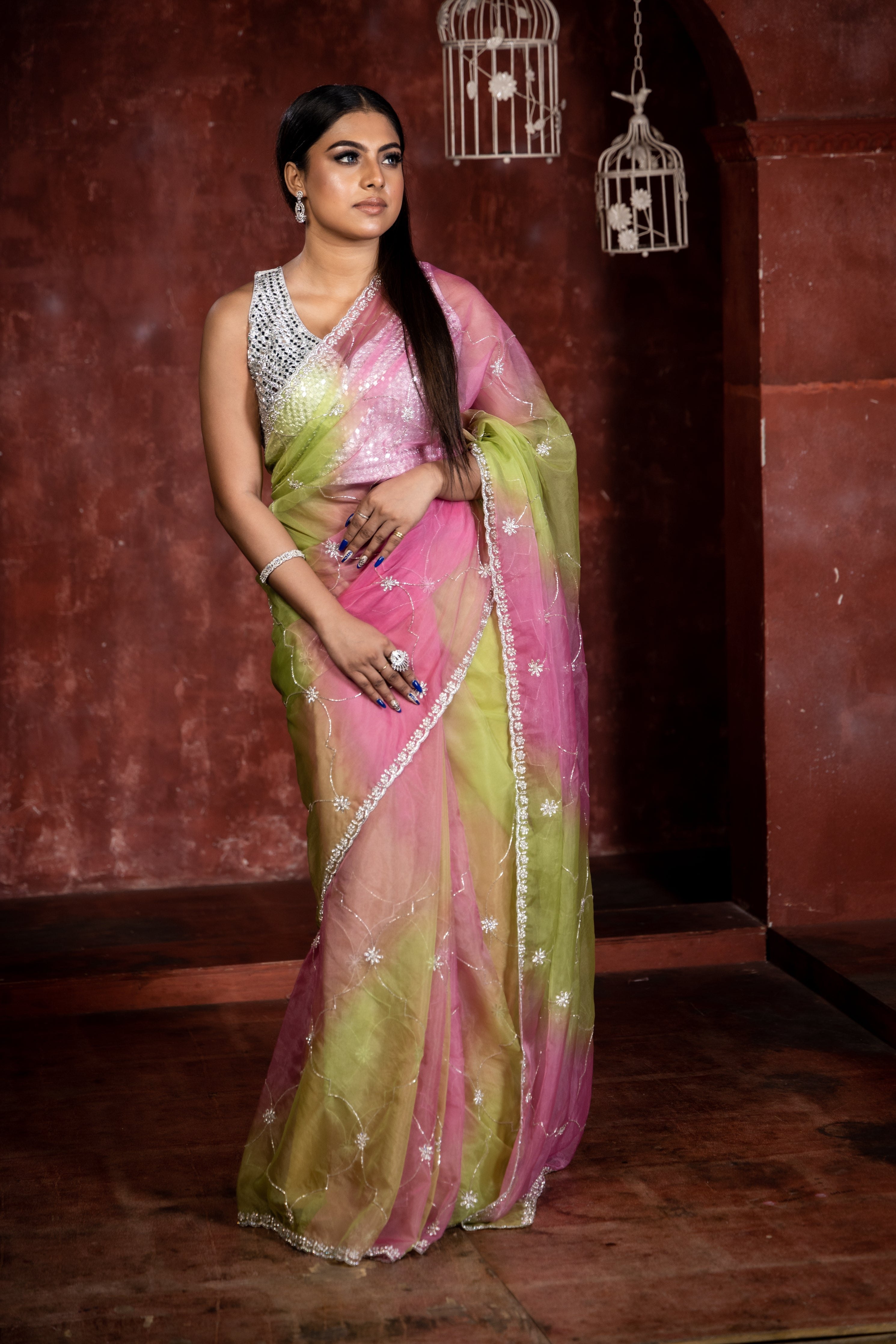 Rhea || Parrot Green & Onion Pink shaded Rangkaat Tie & Dye Soft Organza Fancy Saree with all over Stone & Zardosi Handwork Floral Buta, Silver Cut-dana Jaal and Floral Border with Silver Zari piping