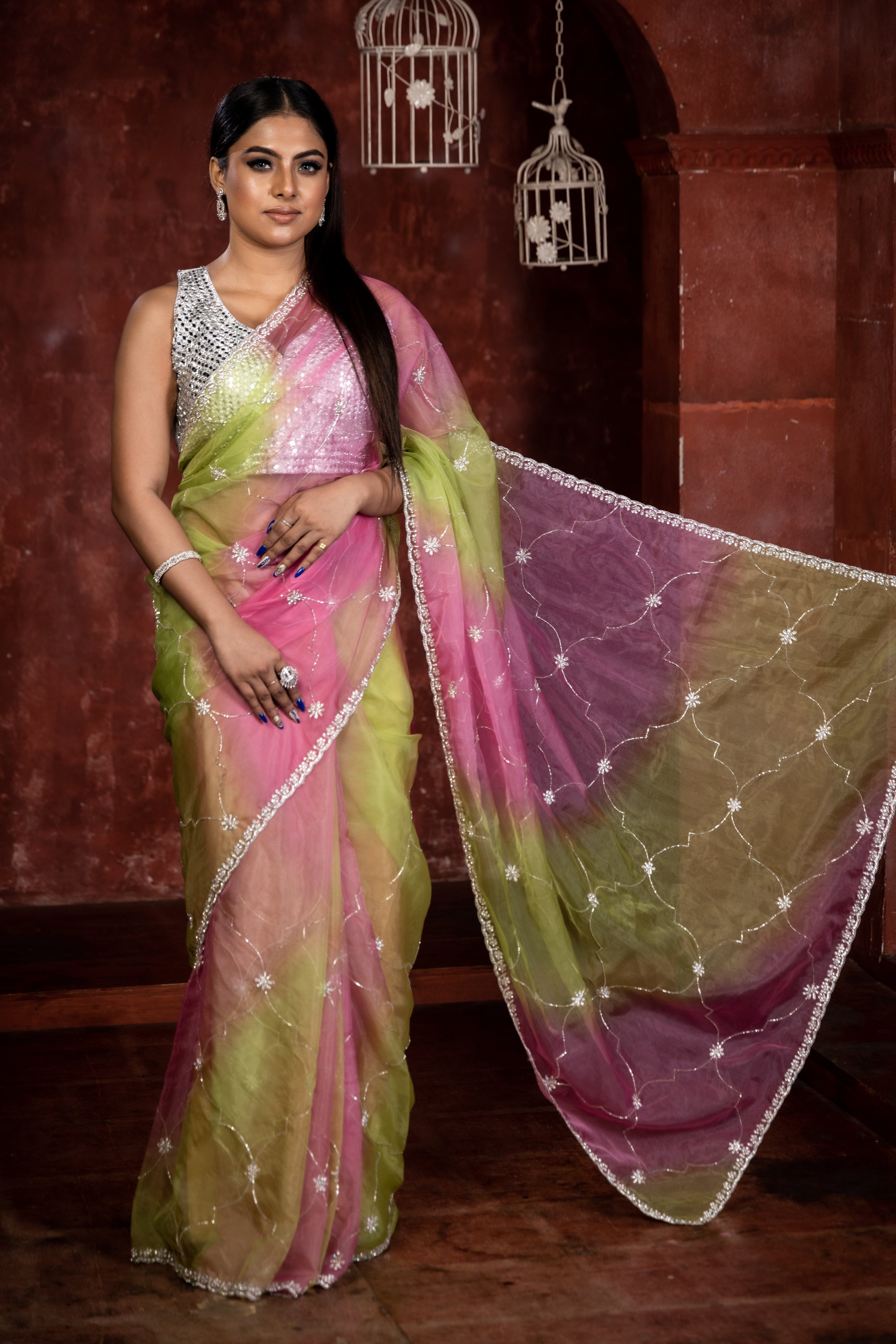 Rhea || Parrot Green & Onion Pink shaded Rangkaat Tie & Dye Soft Organza Fancy Saree with all over Stone & Zardosi Handwork Floral Buta, Silver Cut-dana Jaal and Floral Border with Silver Zari piping