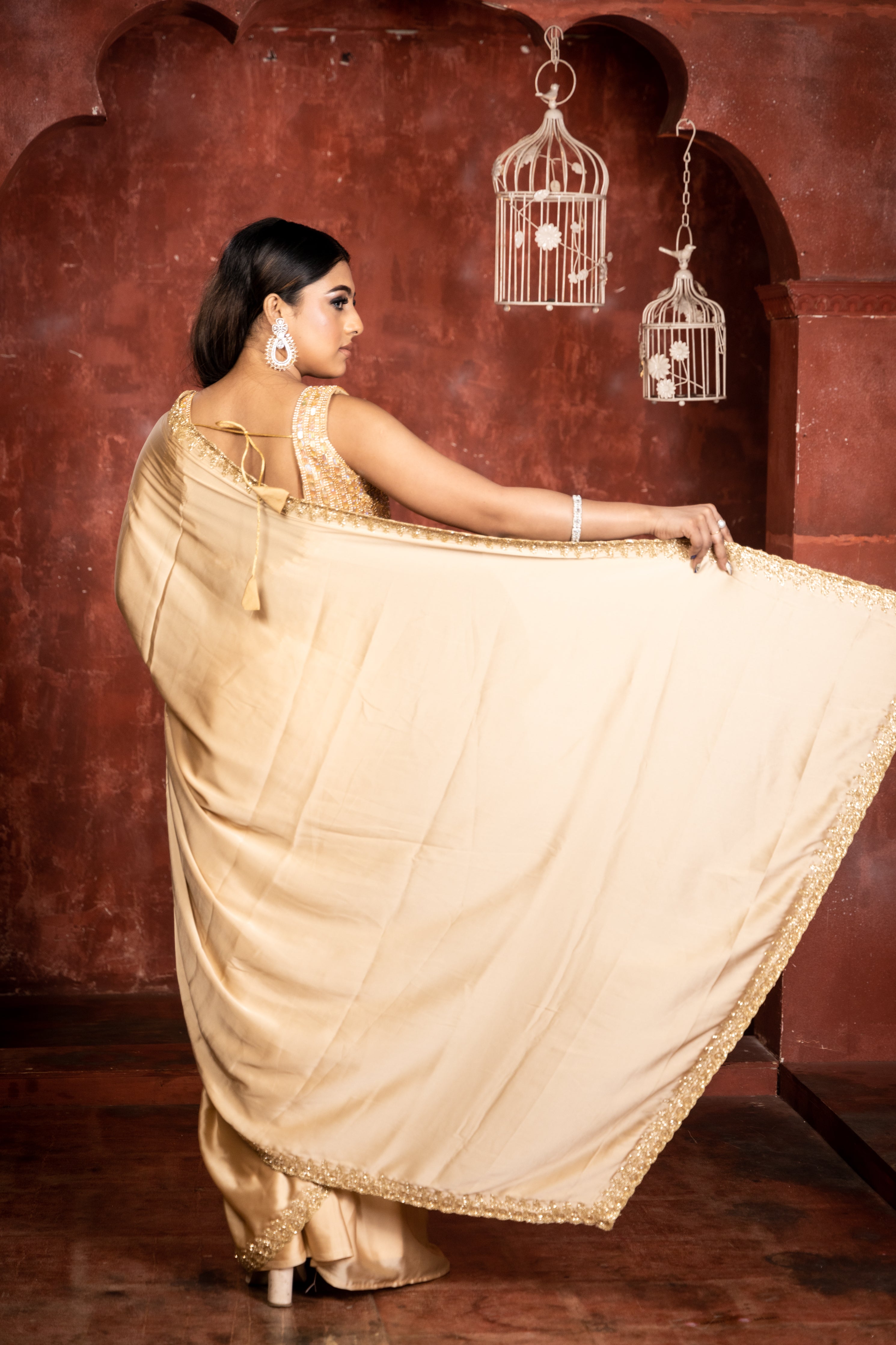 Gold Rush || Champagne Gold Satin Georgette Fancy Saree with all over Plain body and Cut-dana & Stone Handwork Floral Border