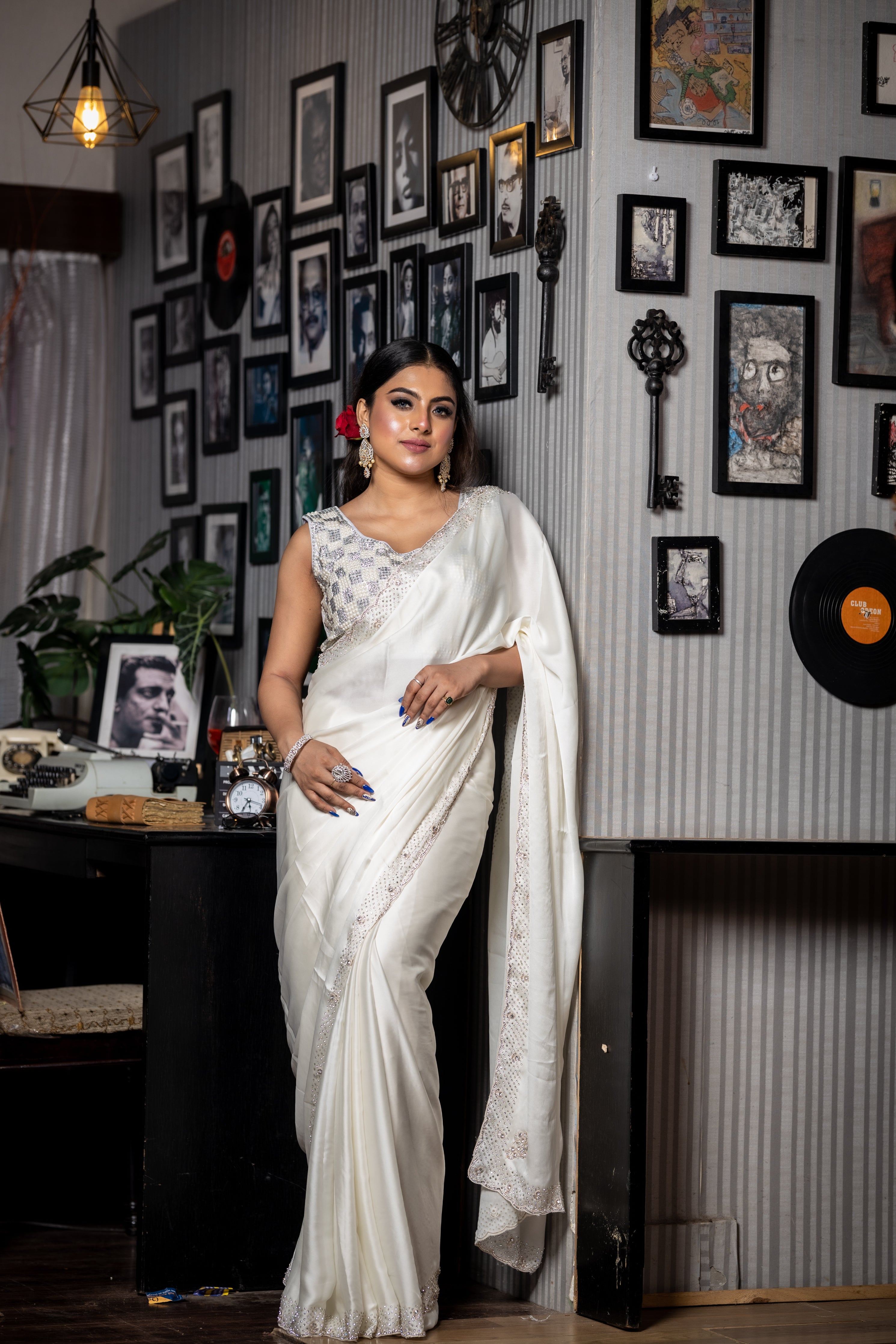 Celestia || Pearl White Satin Crepe Fancy Saree with Plain Body and Sequins & Zardosi Handwork with Swarovski Embellishments