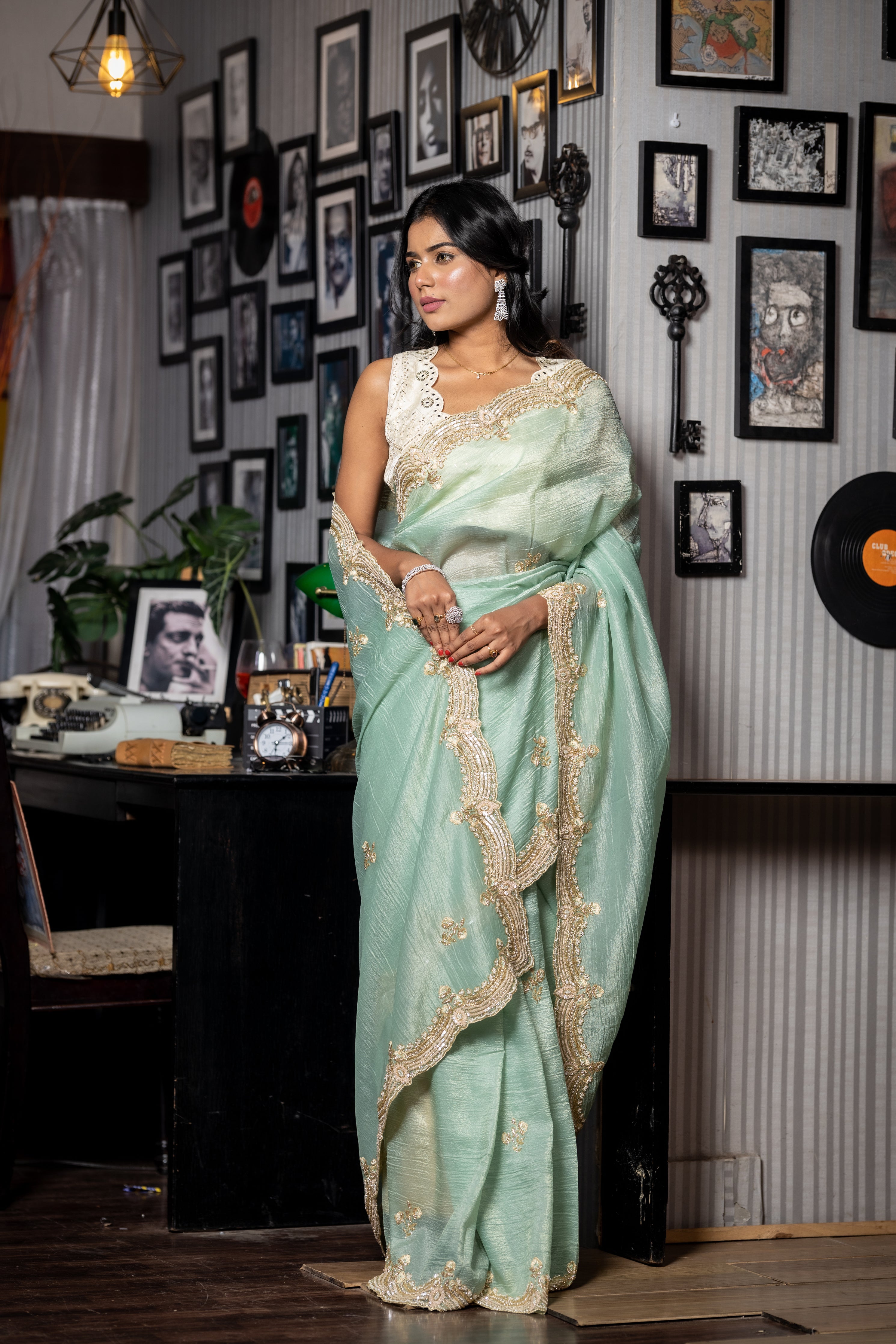 Reva || Sea Green & Gold dual tone Crushed Silk Tissue Fancy Saree with all over Cut-dana, Sequins, Moti, Resham & Matte Copper Zardosi Handwork Floral Buta and Border with Stone highlights