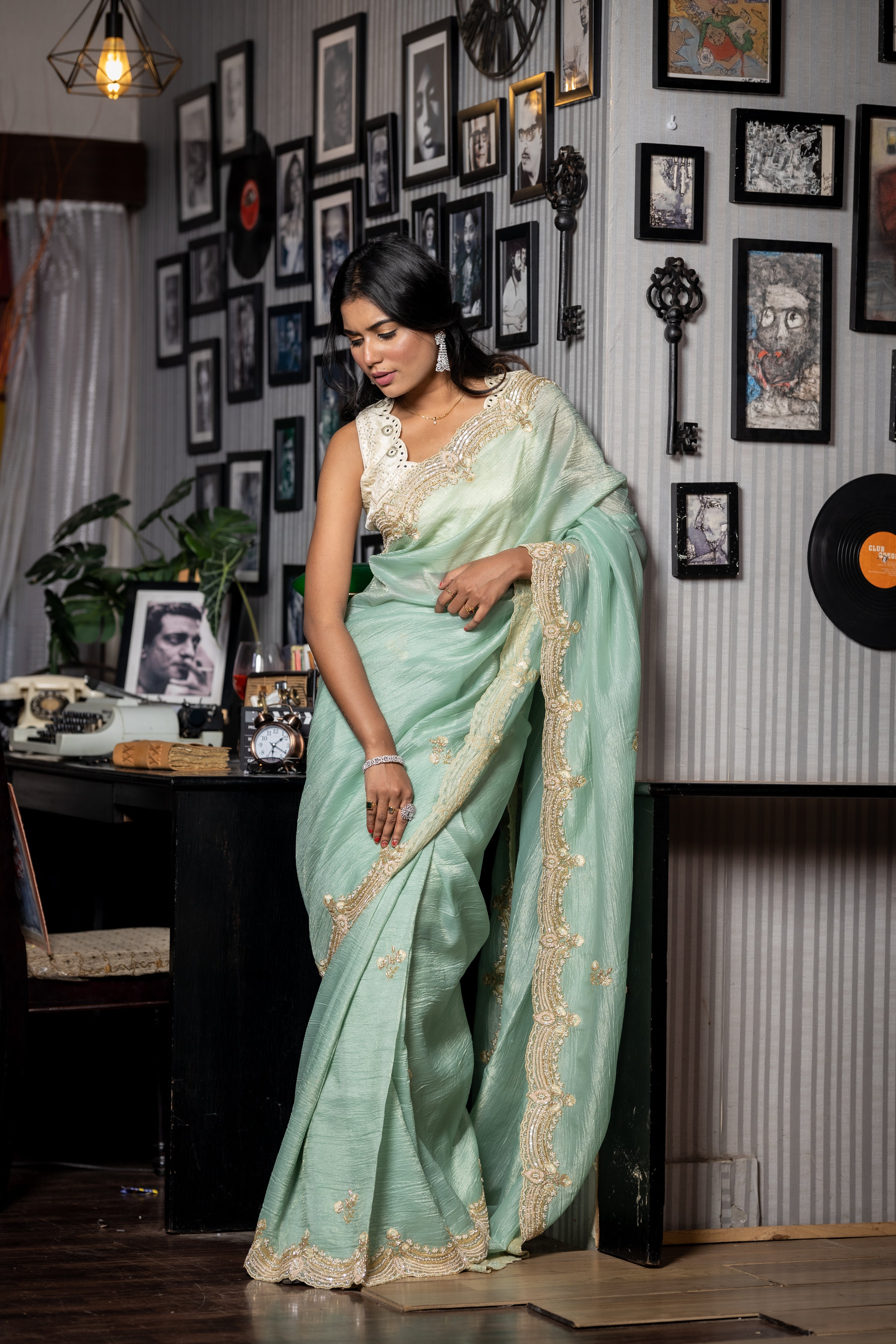 Reva || Sea Green & Gold dual tone Crushed Silk Tissue Fancy Saree with all over Cut-dana, Sequins, Moti, Resham & Matte Copper Zardosi Handwork Floral Buta and Border with Stone highlights