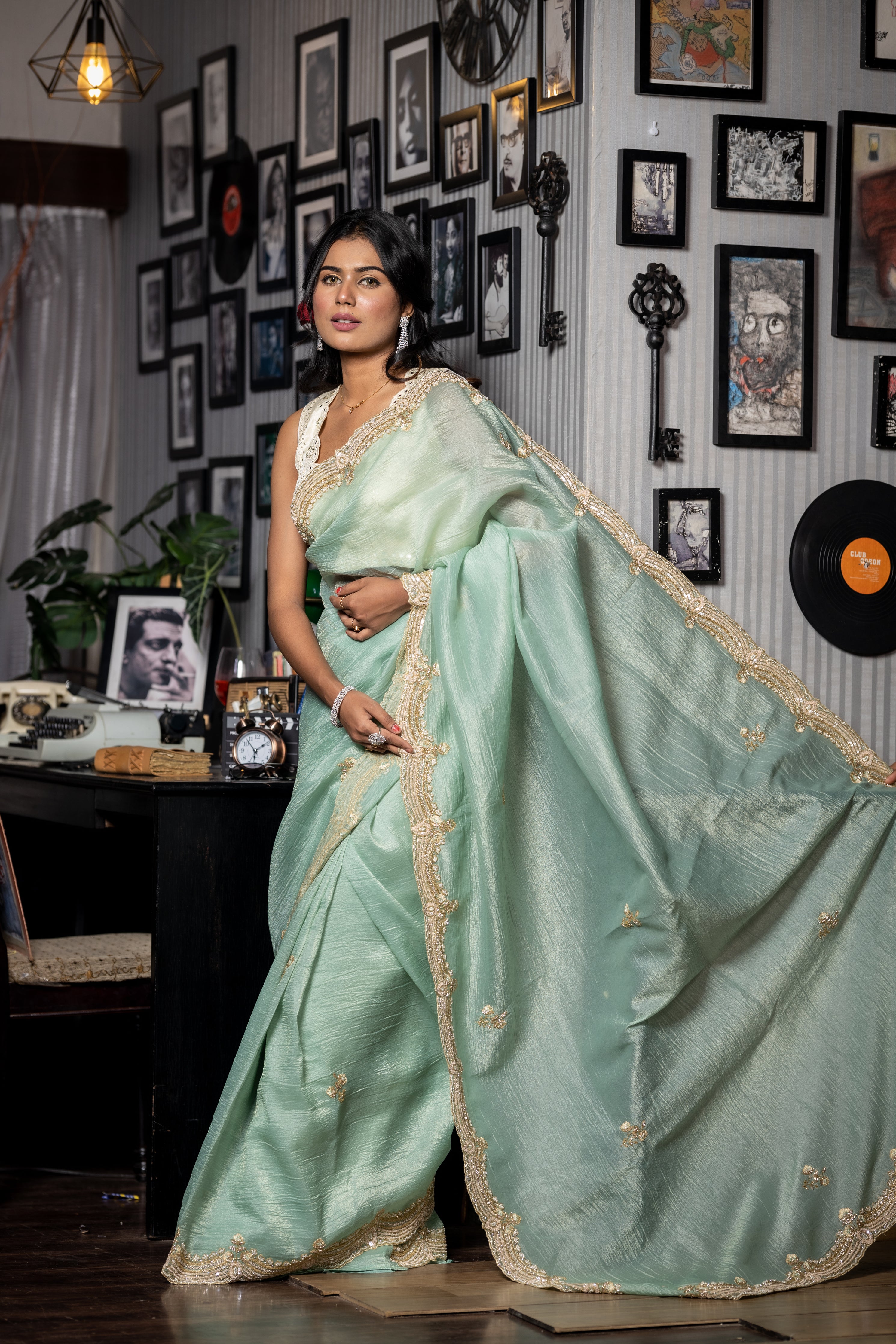 Reva || Sea Green & Gold dual tone Crushed Silk Tissue Fancy Saree with all over Cut-dana, Sequins, Moti, Resham & Matte Copper Zardosi Handwork Floral Buta and Border with Stone highlights