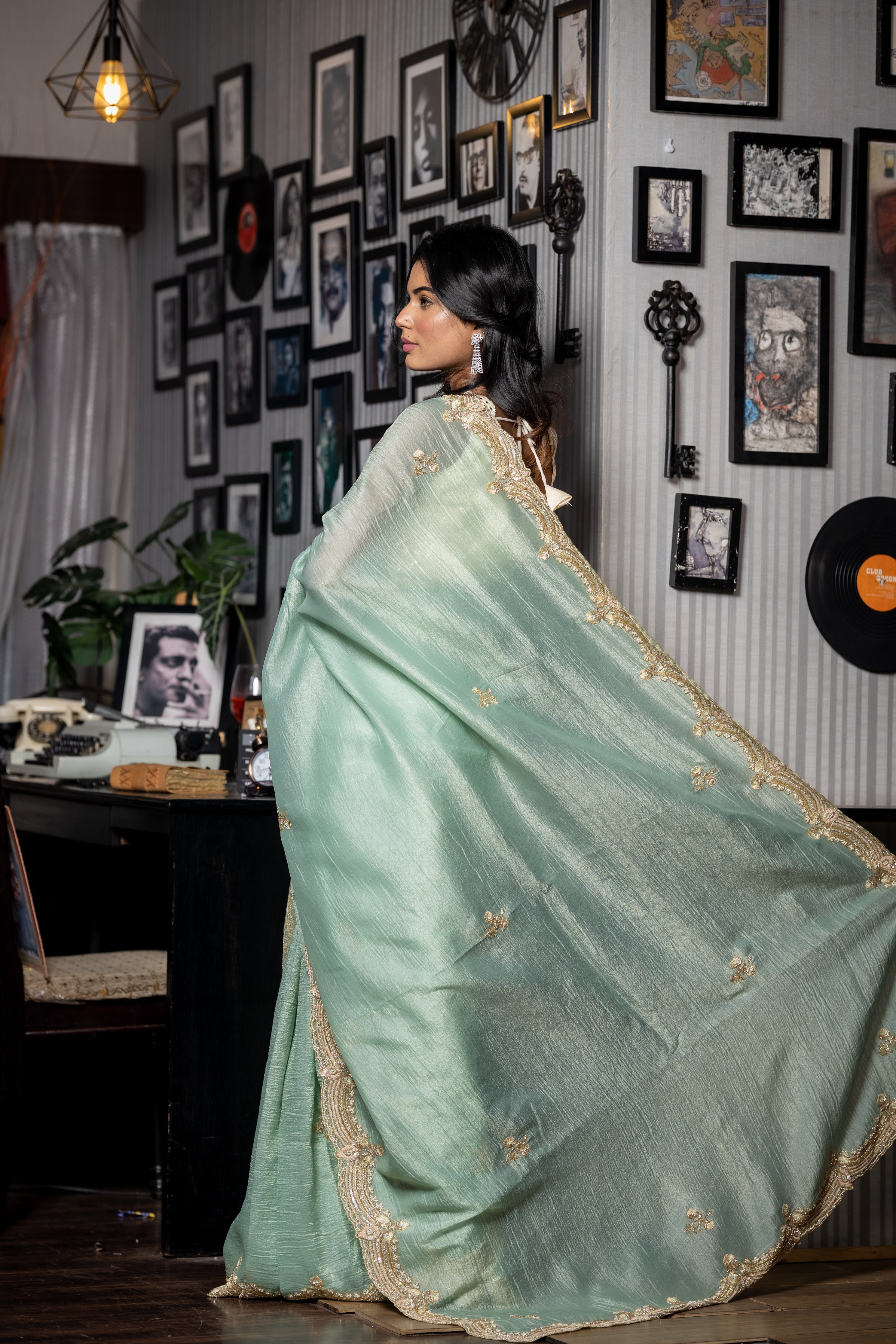 Reva || Sea Green & Gold dual tone Crushed Silk Tissue Fancy Saree with all over Cut-dana, Sequins, Moti, Resham & Matte Copper Zardosi Handwork Floral Buta and Border with Stone highlights