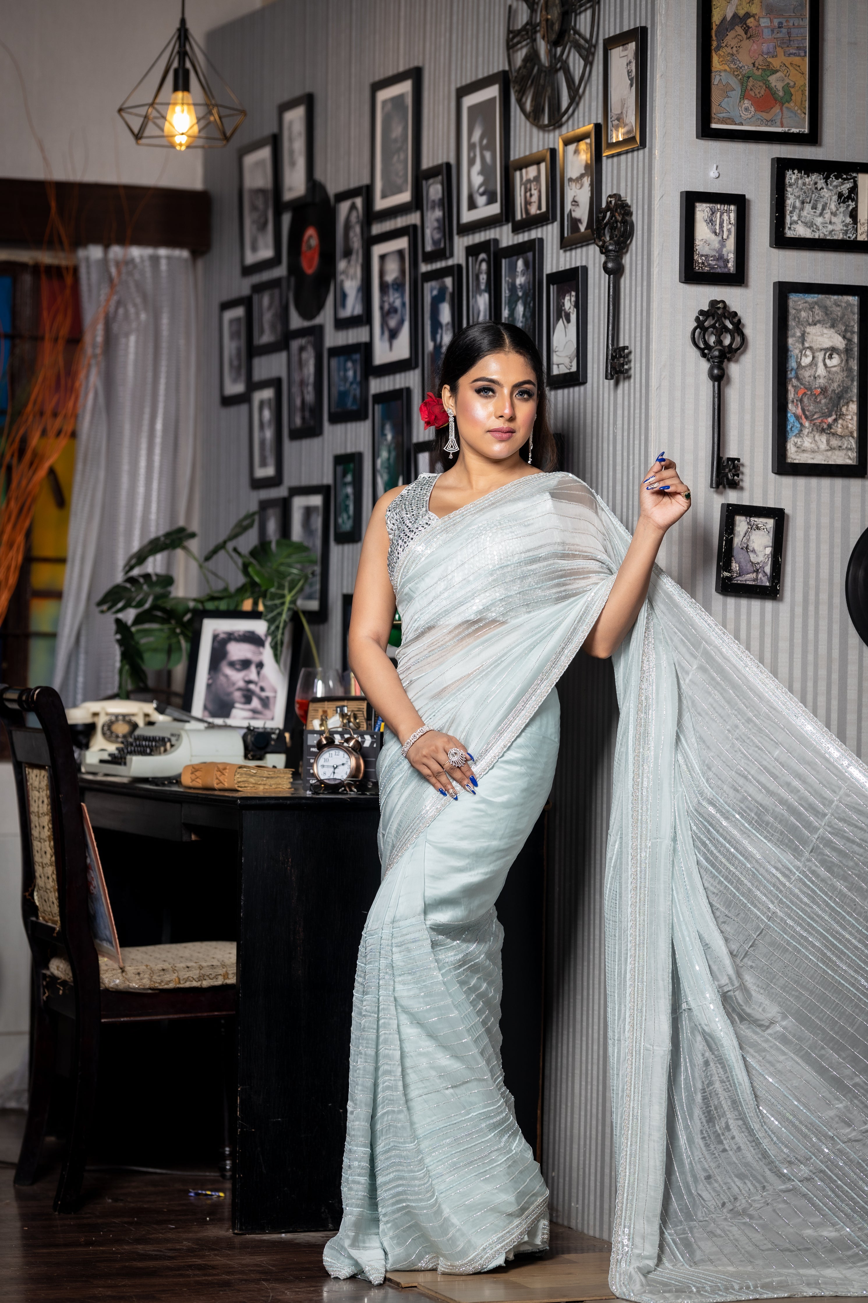 Crystal || Ice Blue Soft Organza Fancy Saree with all over Silver Cut-dana & Ice Blue Sequins Handwork Stripes and sleek Border with Stone highlights