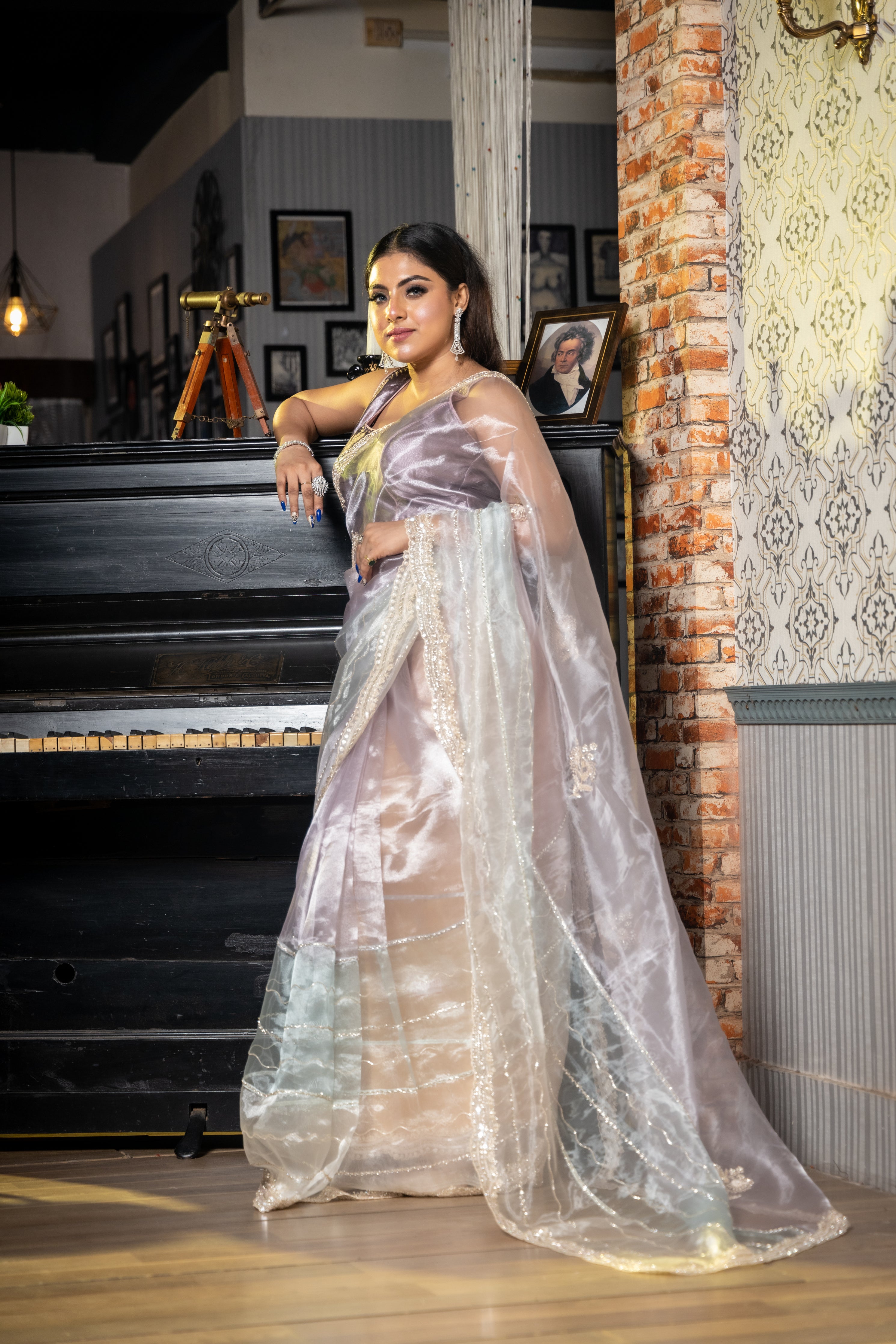 Diva || Lavender, Ice Blue & Off-White shaded Glass Tissue Fancy Saree with all over Sequins, Cut-dana, Moti & Stone Handwork Stripe and Border