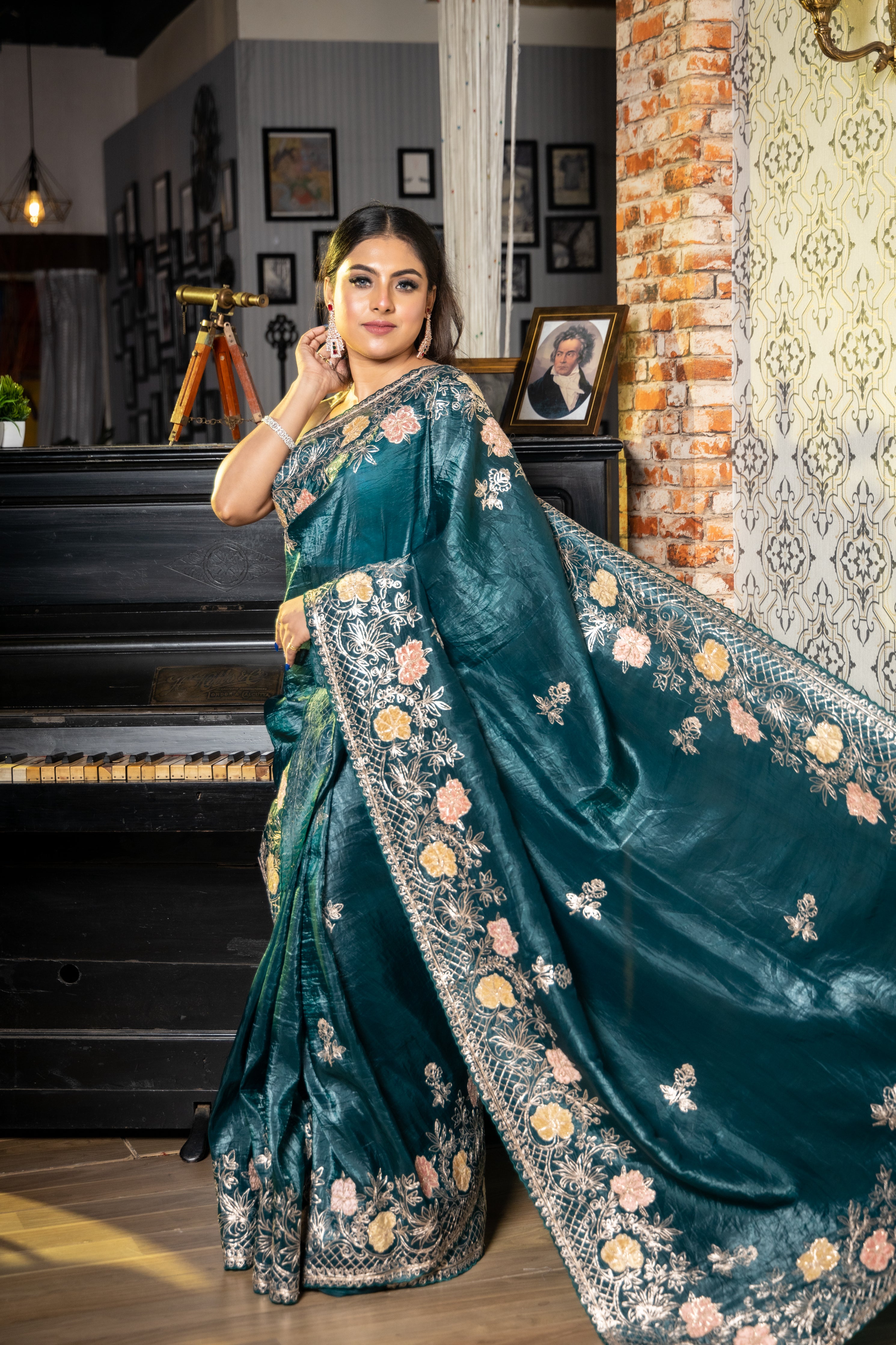 Aurora || Dark Metallic Ocean Green & Black dual tone Crushed Soft Tissue Fancy Saree with all over Pitta Zari Handwork Floral Buta and Multi-colour Applique & Pitta Zari Floral Jaal Border