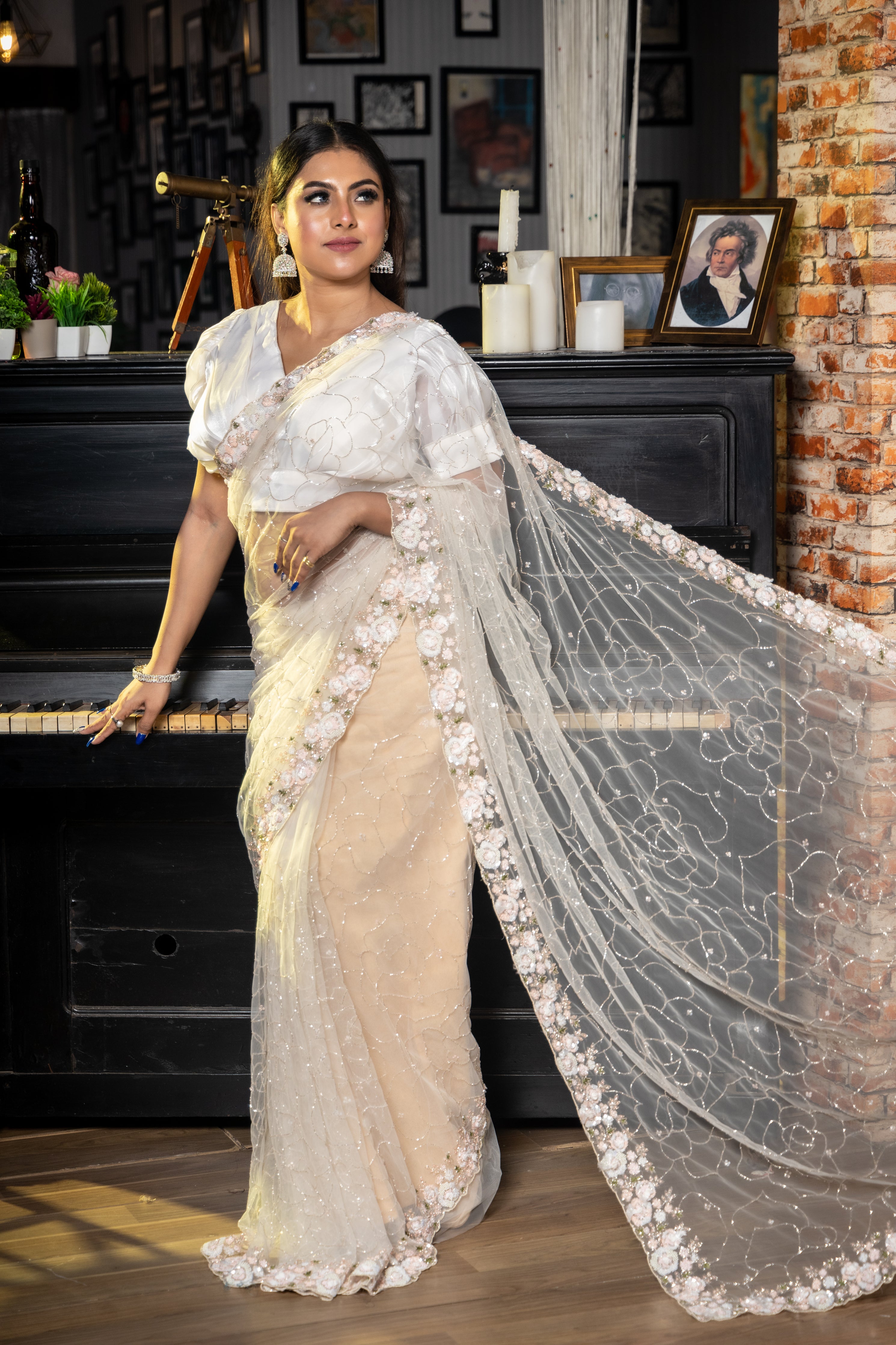 Showstopper || Off-White Net Fancy Saree with all over Cut-dana Jaal body, Sequins & Cut-dana Buti and Multi-colour Sequins, Moti & Cut-dana Handwork Floral Border with Resham highlights