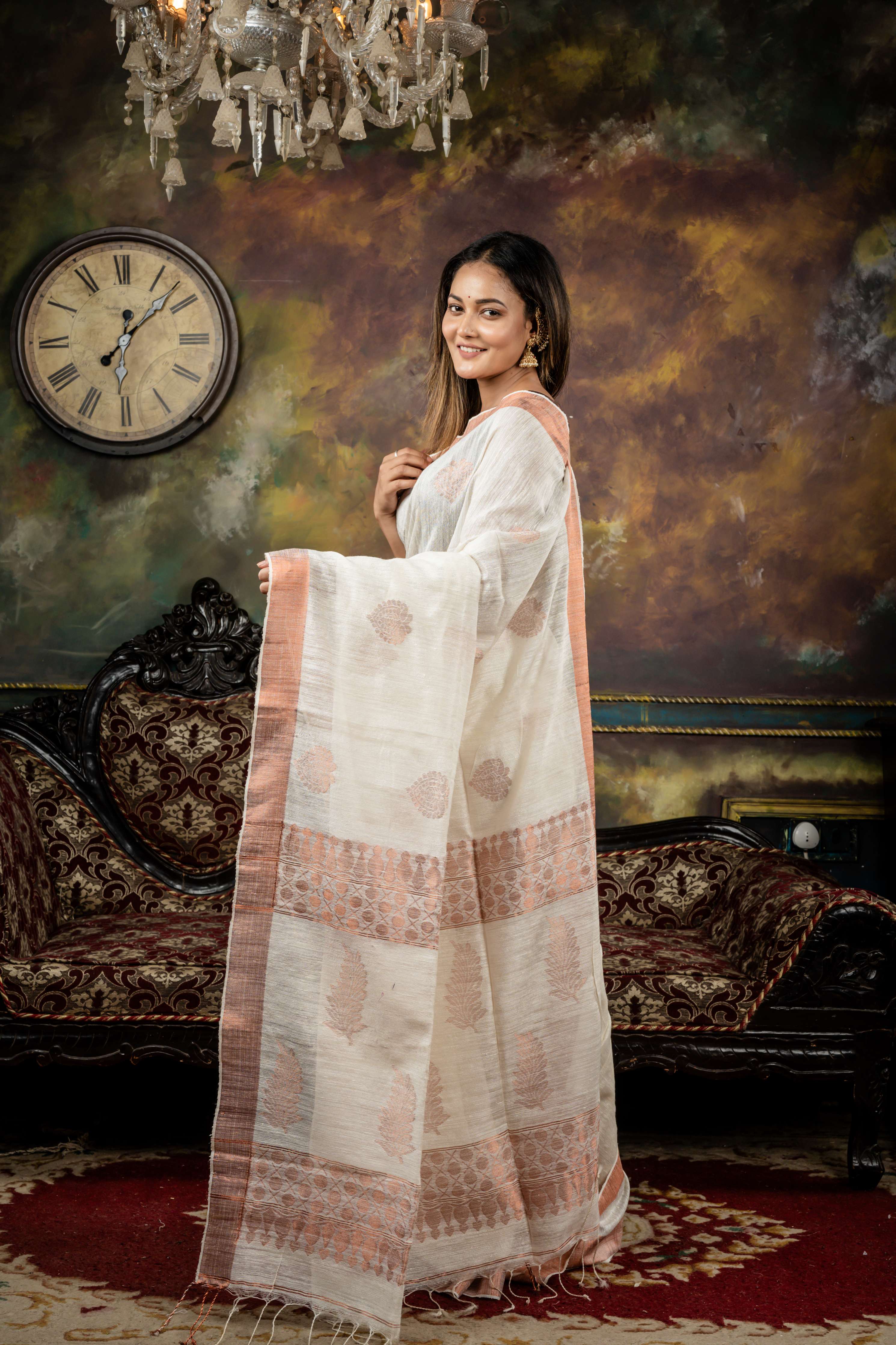 Soumi || Off-White Pure Matka Bengal Handloom Saree with all over Copper Zari Traditional Buta and 'Leaf' motif Pallu