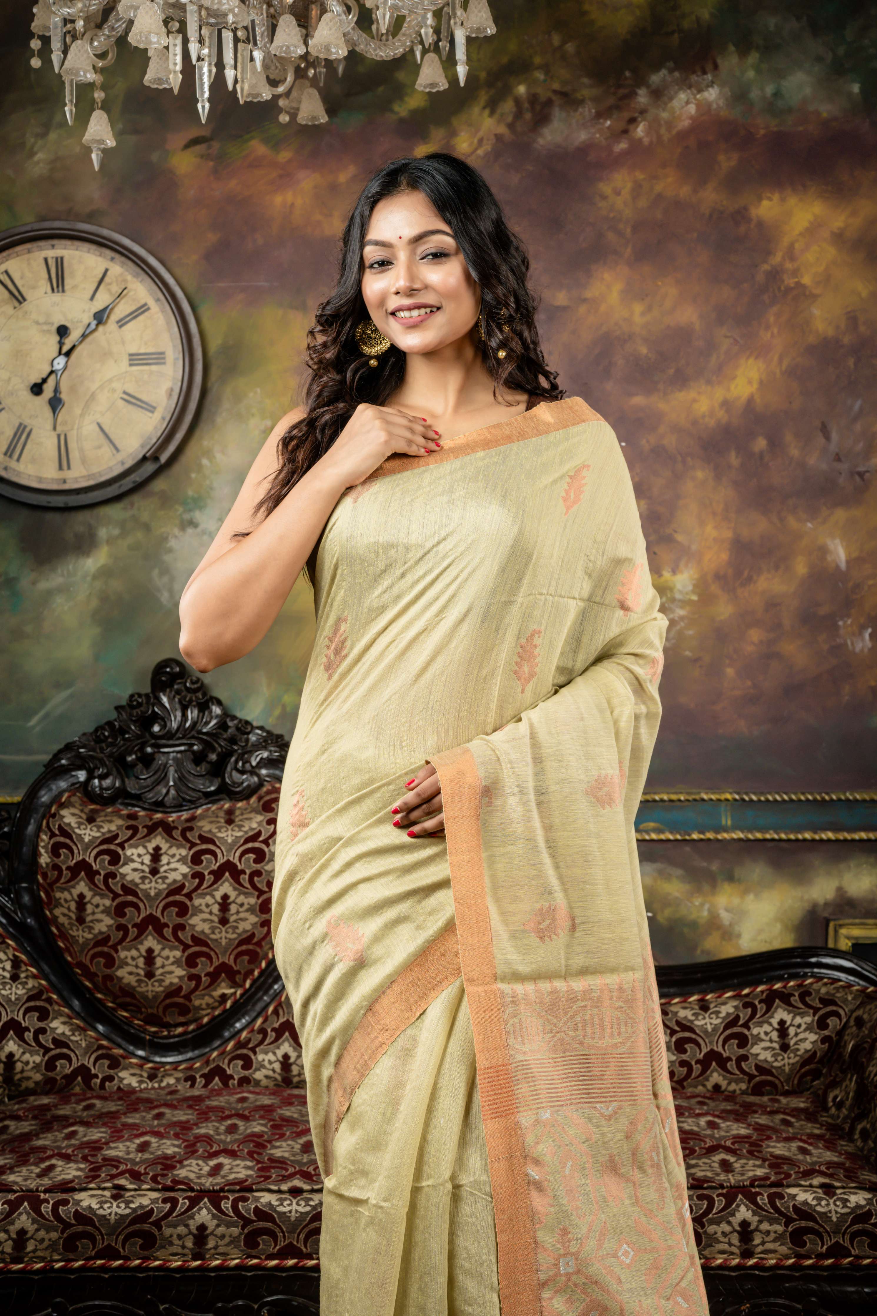 Giribala || Light Pista Green Matka Bengal Handloom Saree with all over Copper Zari Buta and 'Karat motif Pallu with Silver Zari highlights