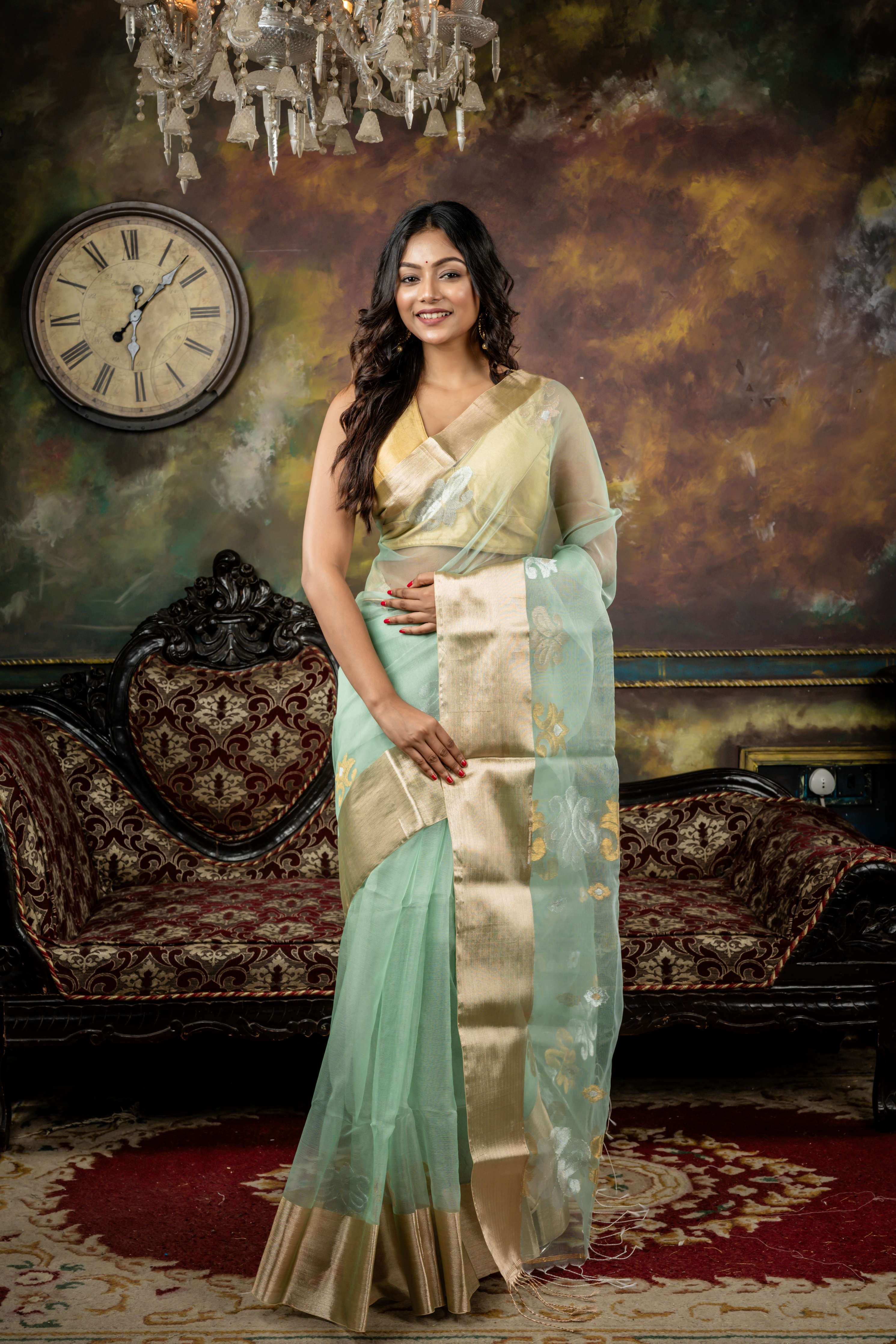 Mohona || Sea Green Muslin Bengal Handloom Saree with all over Golden, Silver & Matte Gold Zari Traditional Buta, Matte Gold Zari 'Mahapadh' Border and Traditional motif Pallu