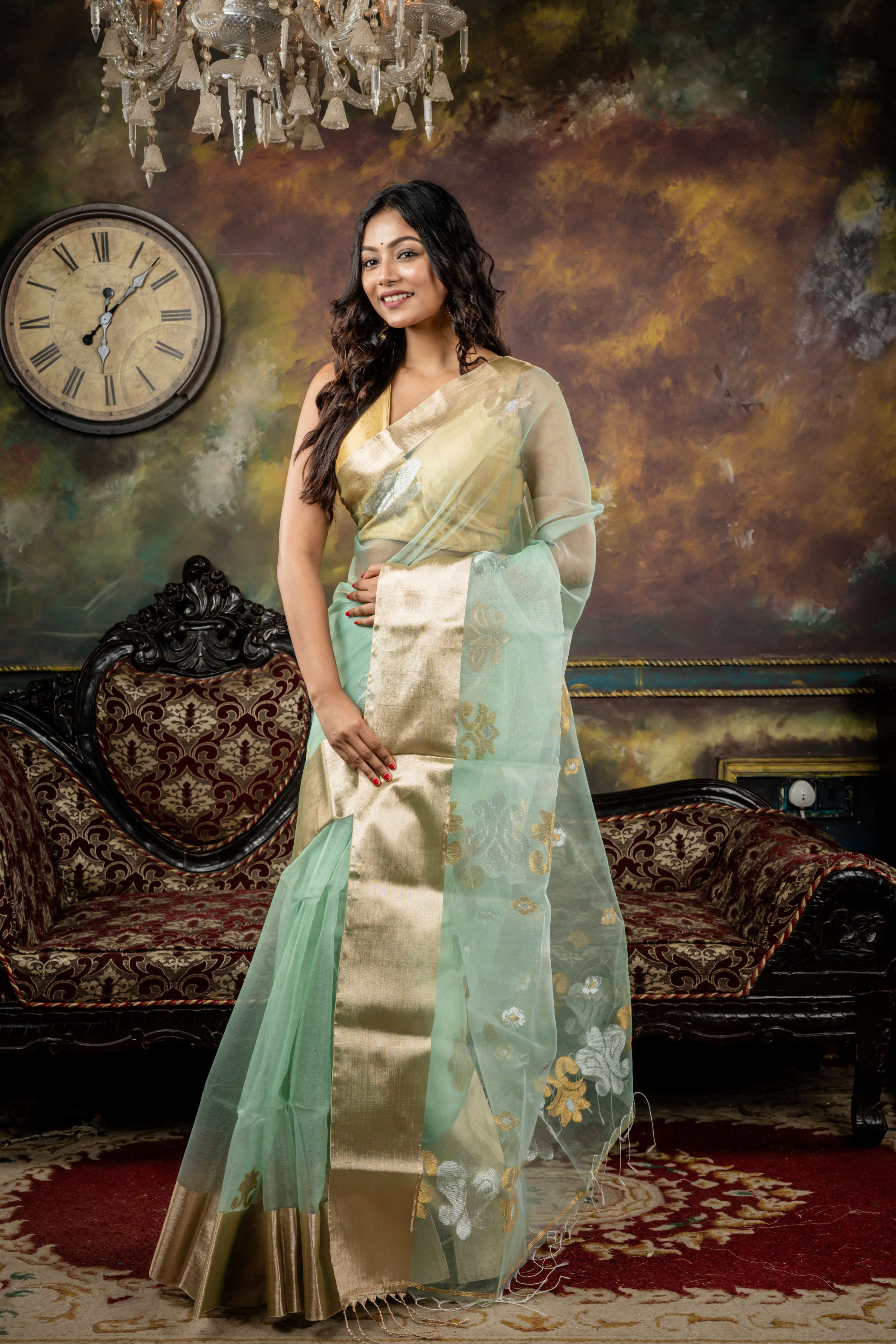 Mohona || Sea Green Muslin Bengal Handloom Saree with all over Golden, Silver & Matte Gold Zari Traditional Buta, Matte Gold Zari 'Mahapadh' Border and Traditional motif Pallu