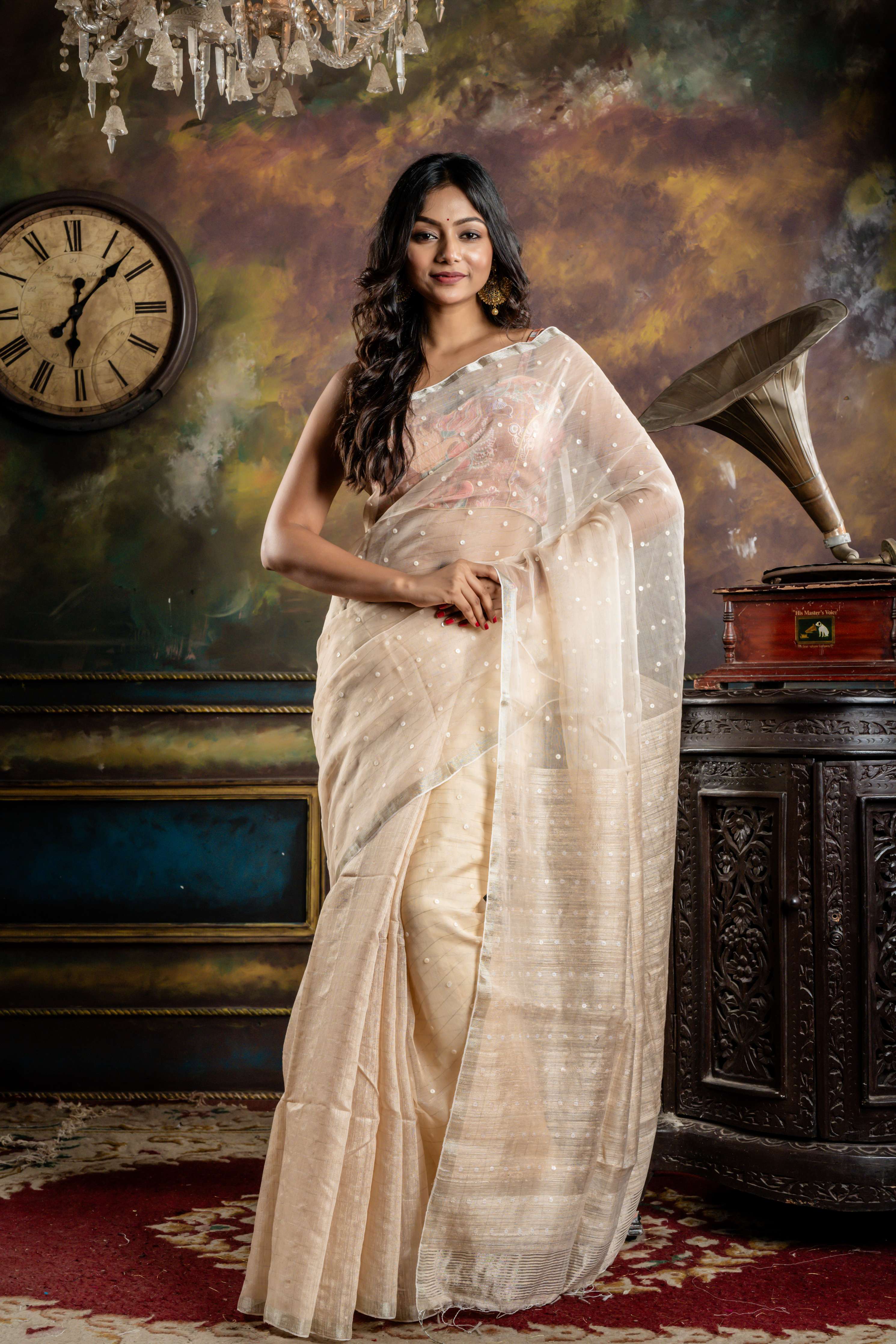 Ektara || Pearl White Half Matka & Half Muslin Bengal Handloom Saree with Half Body Plain, woven Sea Shell buttons with Silver Zari Stripes Half Body & Pallu and Silver Zari Border