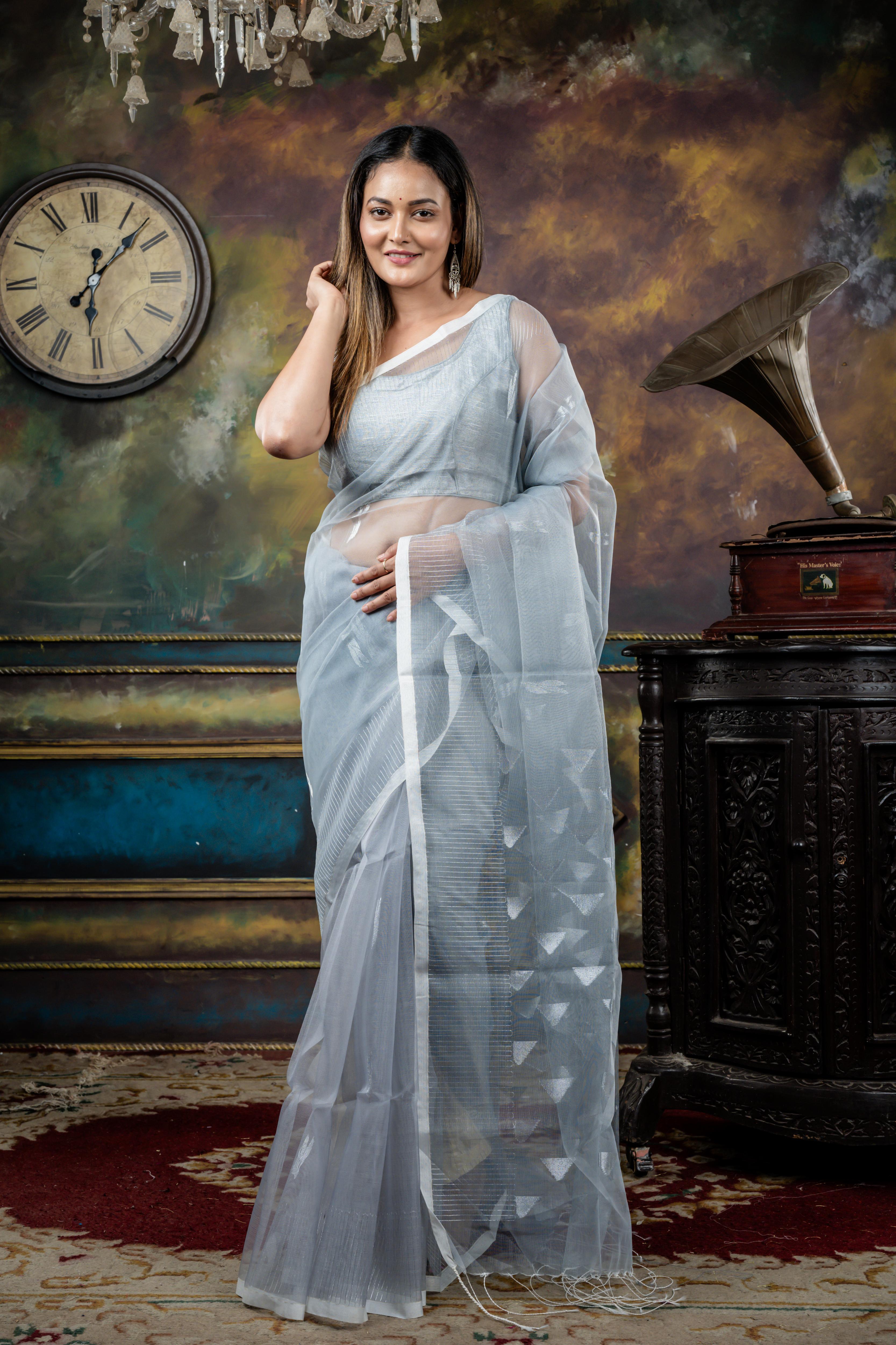 Jyotsna || Grey Muslin Saree with all over Silver Zari Abstract Buta, Stripe Border and 'Temple' motif Pallu