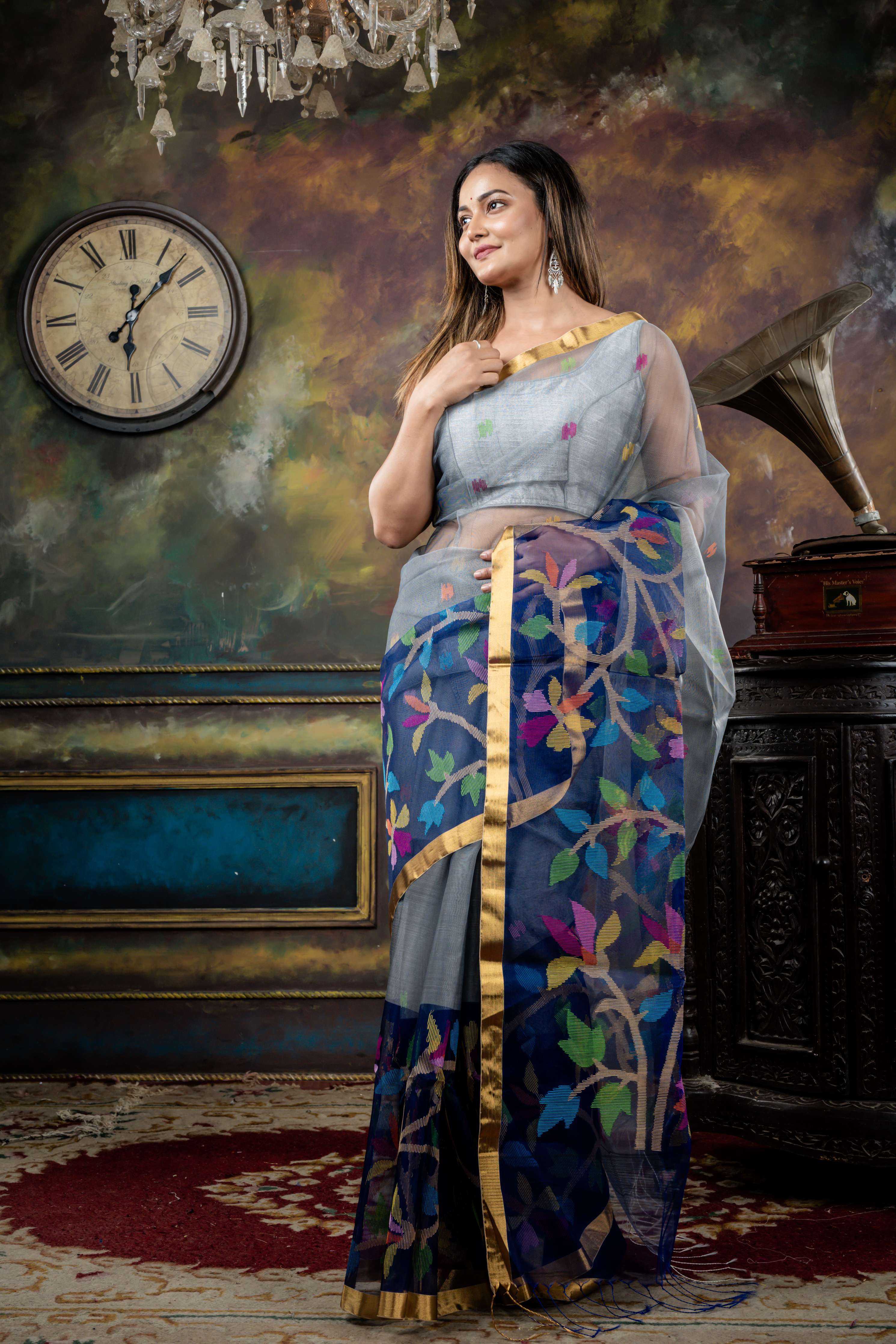 Sulata || Smokey Grey Premium Muslin Bengal Handloom Saree with all over Multi-colour Jamdani Buta and Midnight Blue Floral Jamdani 'Mahapadh' Border & Pallu