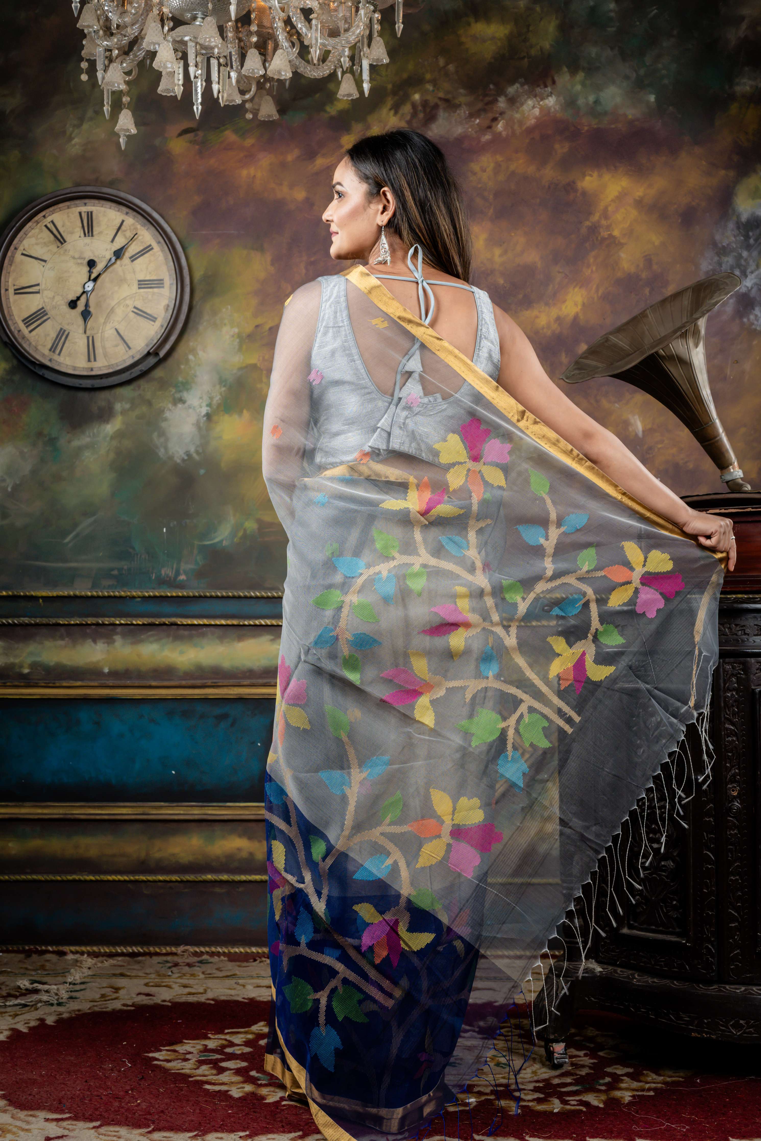 Sulata || Smokey Grey Premium Muslin Bengal Handloom Saree with all over Multi-colour Jamdani Buta and Midnight Blue Floral Jamdani 'Mahapadh' Border & Pallu