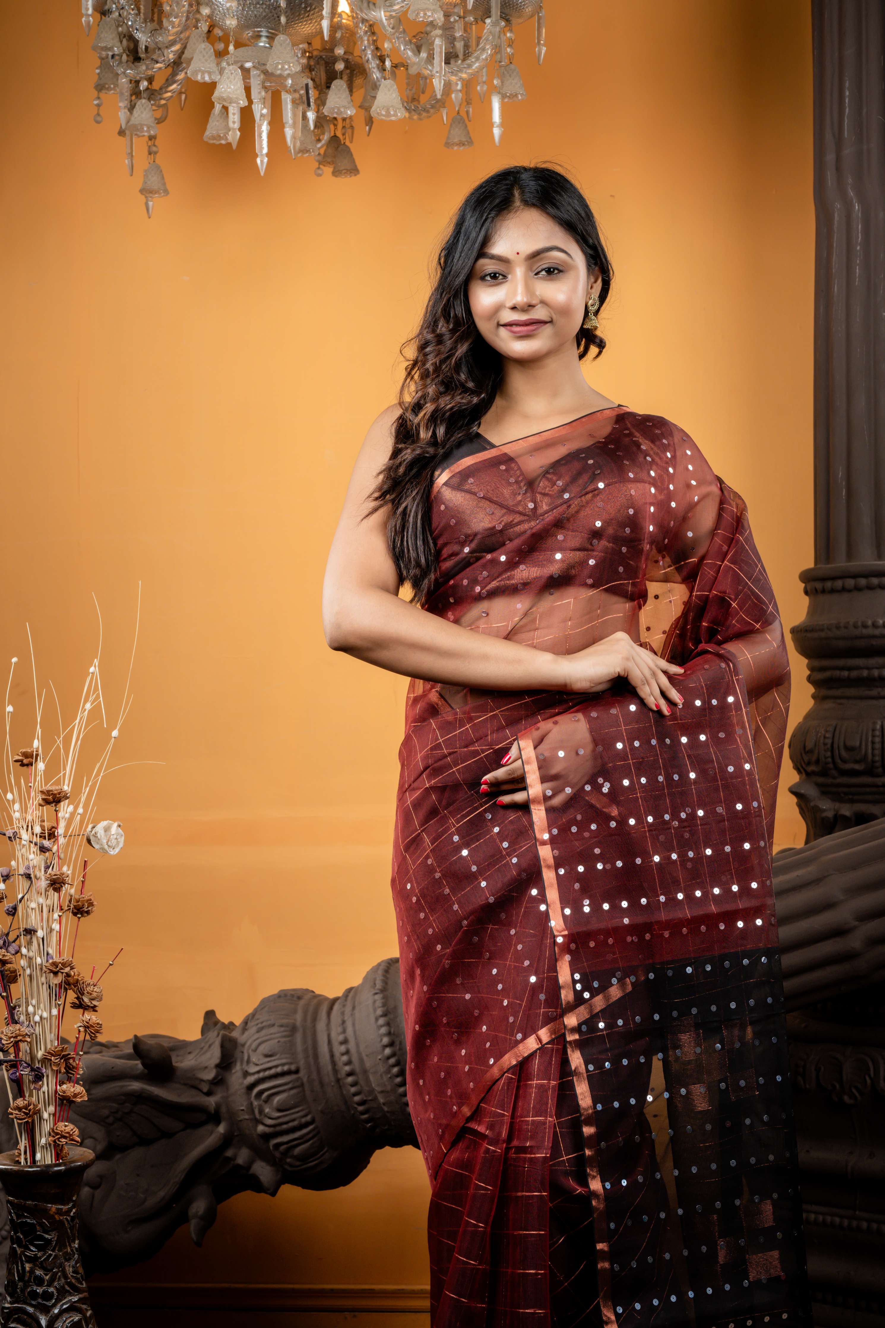 Jhilmil || Rosewood Brown Muslin Bengal Handloom Saree with all over Copper Checks, half body Sequins highlights, half body Plain Black Border and Copper Checks with Sequins highlights Pallu