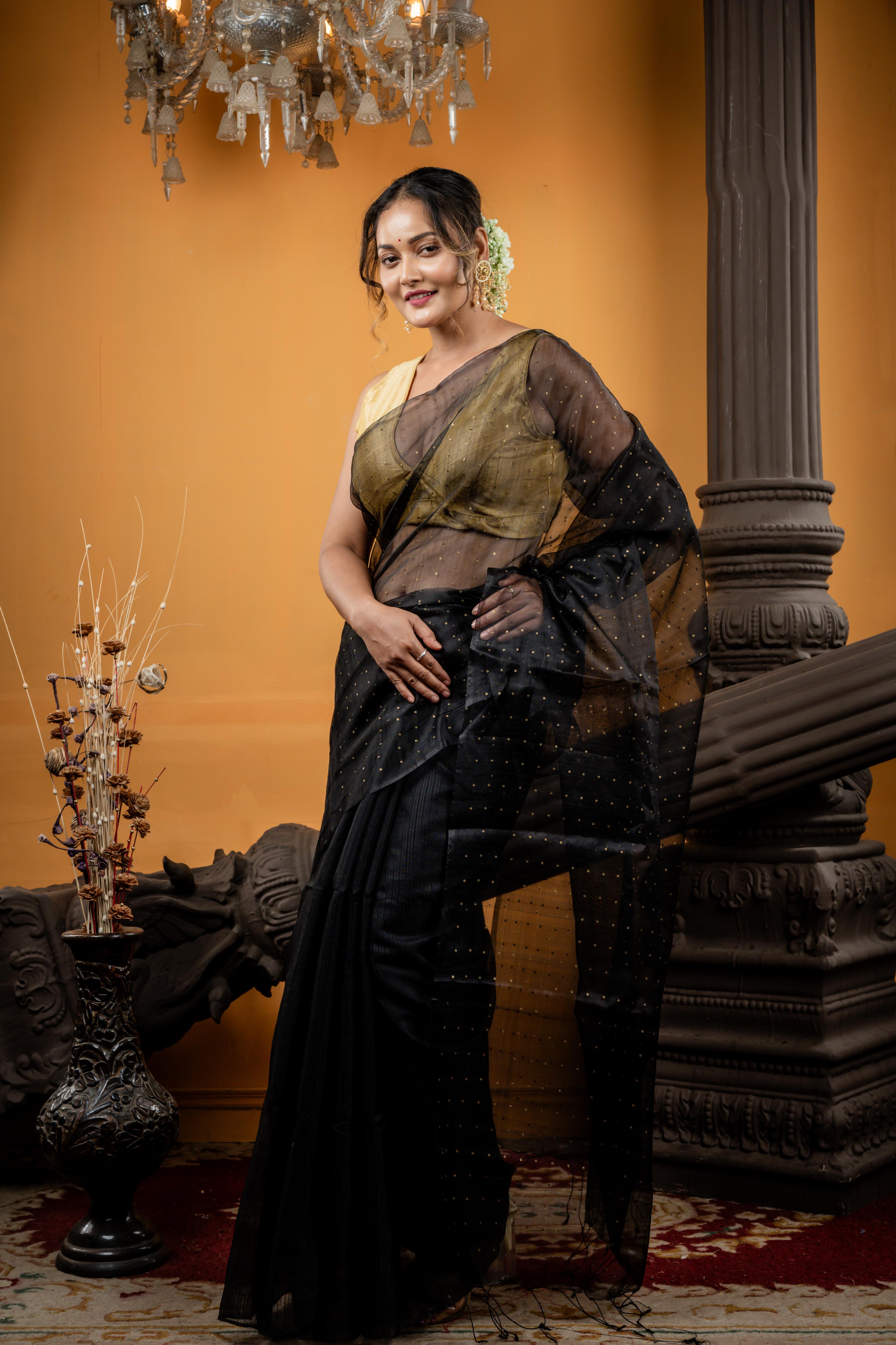 Jonaki || Black Premium 'Matka-Muslin' half & half Bengal Handloom Saree with Plain Half Body and woven Antique Gold Small Sequins Half Body & Pallu
