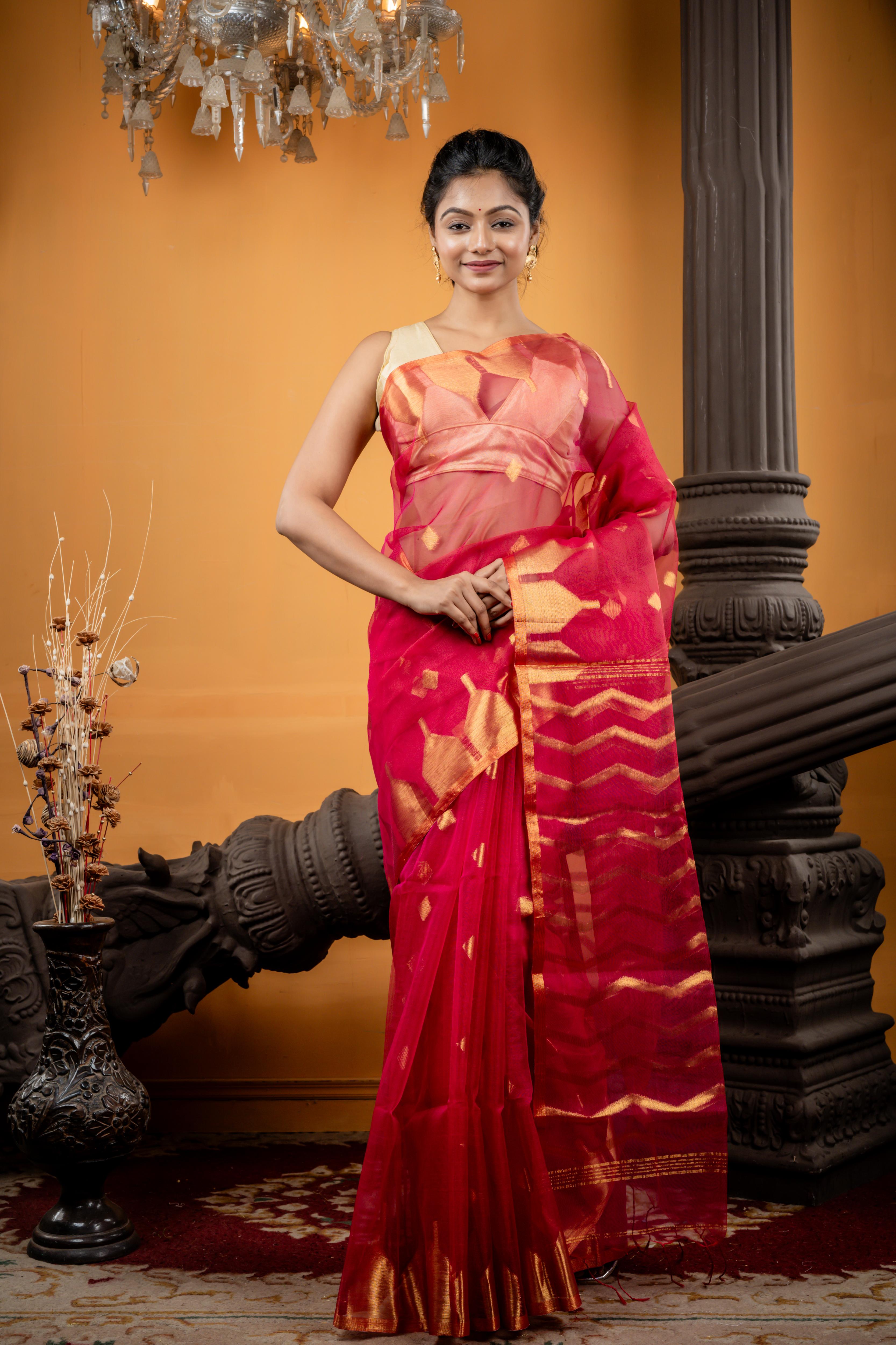 Nabarupa || Magenta Pink Muslin Saree with all over Golden Zari Abstract Buta, ZigZag Stripe Pallu and Sleek Border with 'Temple' motifs
