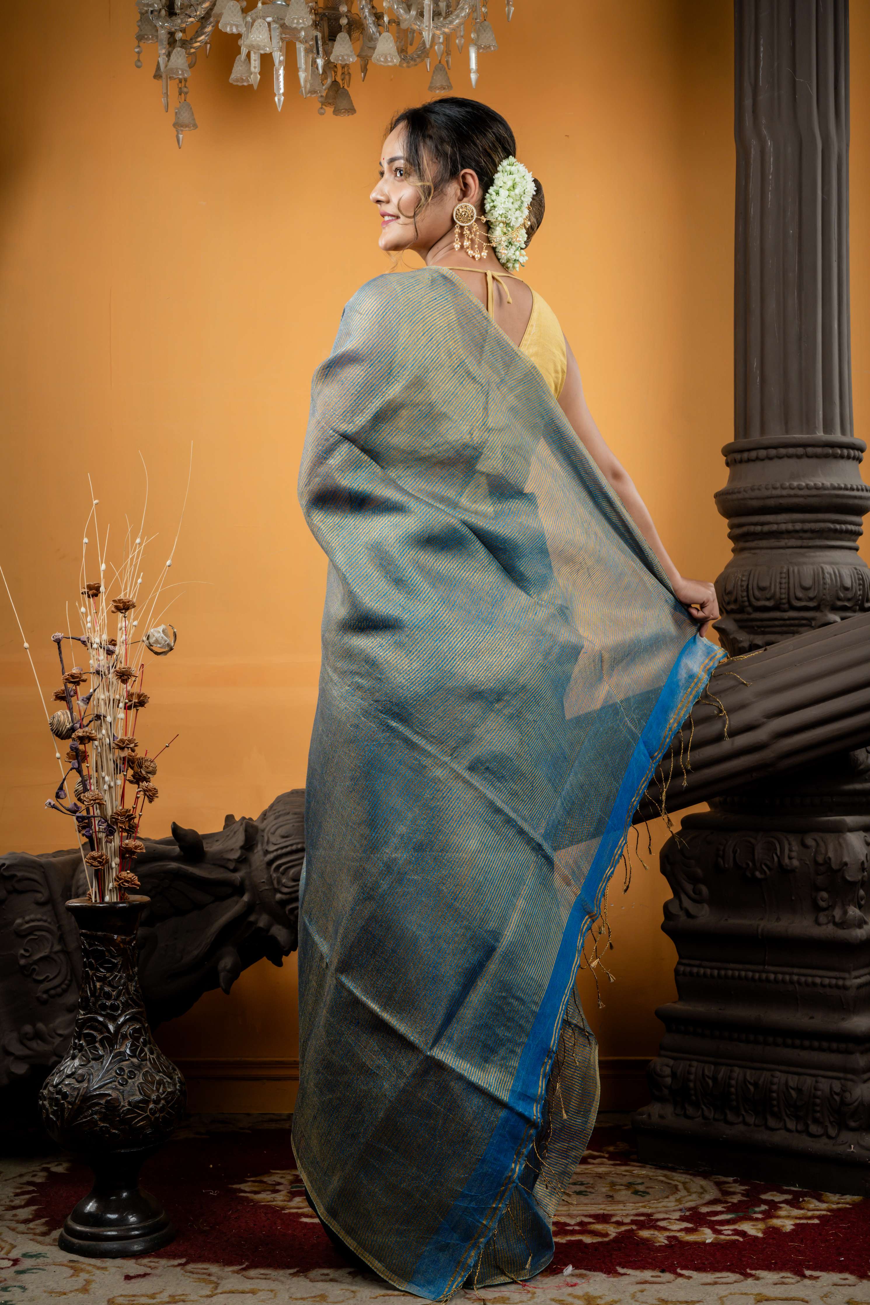 Kaushiki || Dusty Blue Metallic Linen Bengal Handloom Saree with all over Antique Gold Stripes and Sleek Border