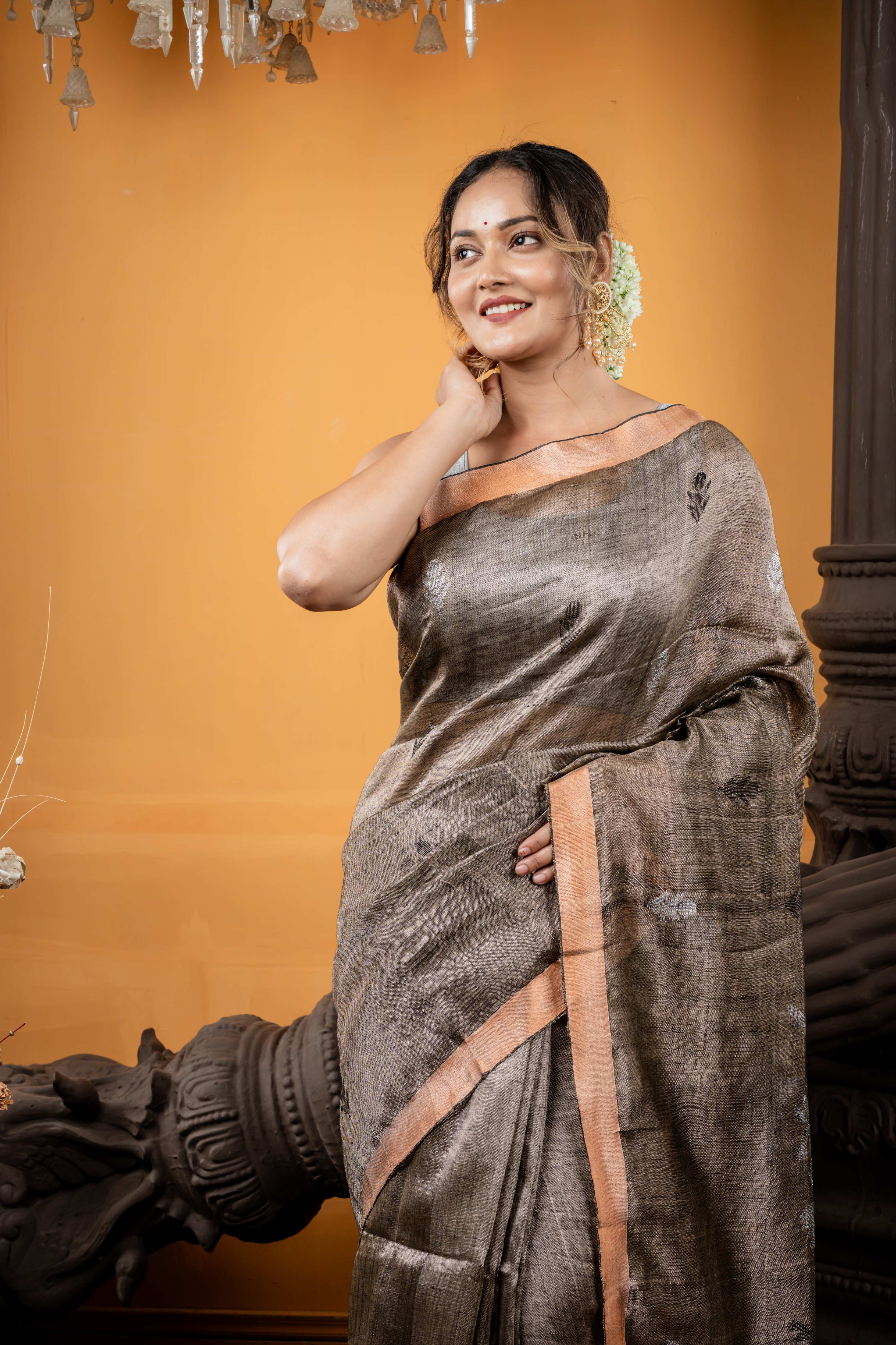 Damini || Metallic Charcoal Brown Linen Matka Bengal Handloom Saree with all over Black Resham & Silver Zari Floral Buta and Jamdani Pallu