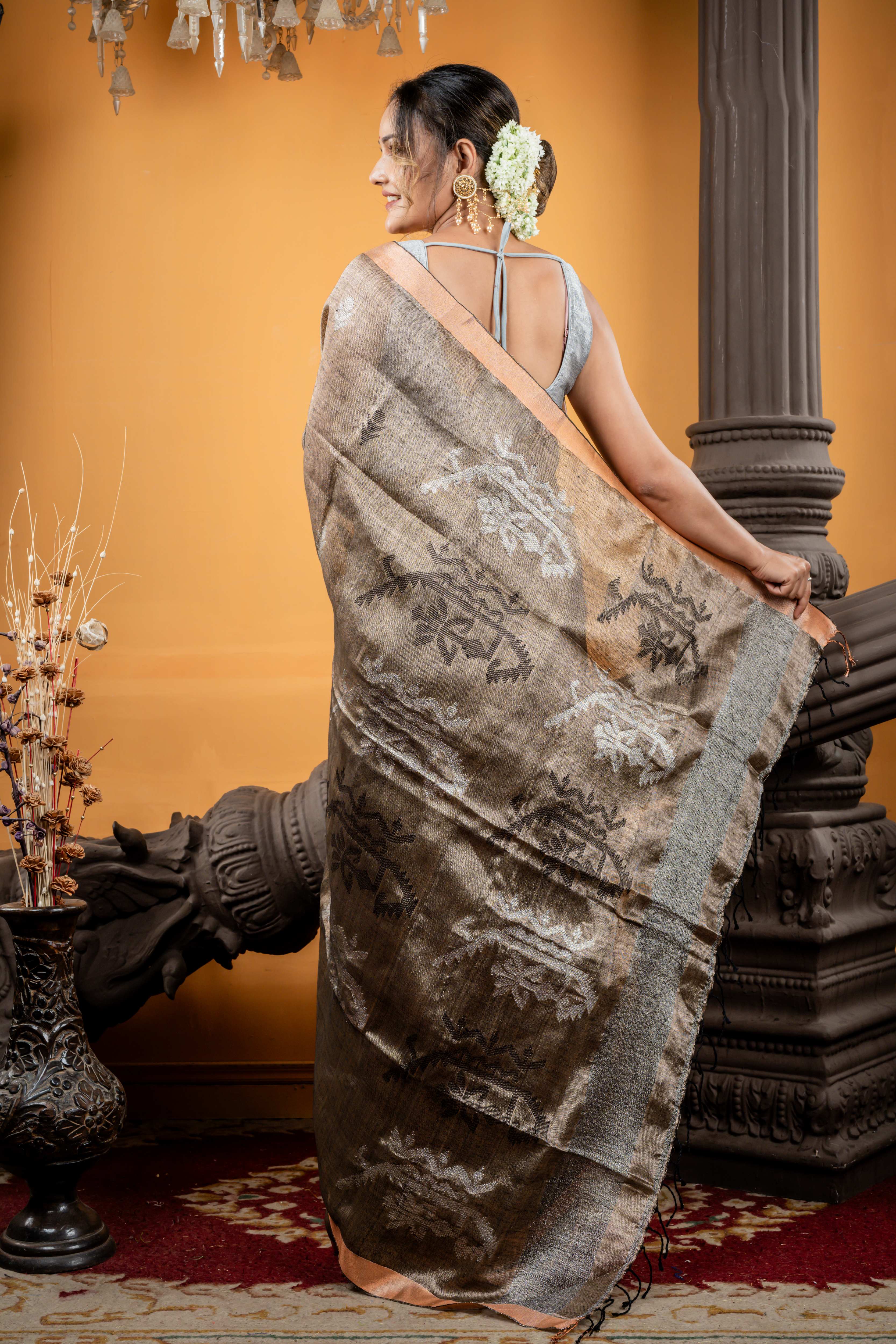 Damini || Metallic Charcoal Brown Linen Matka Bengal Handloom Saree with all over Black Resham & Silver Zari Floral Buta and Jamdani Pallu