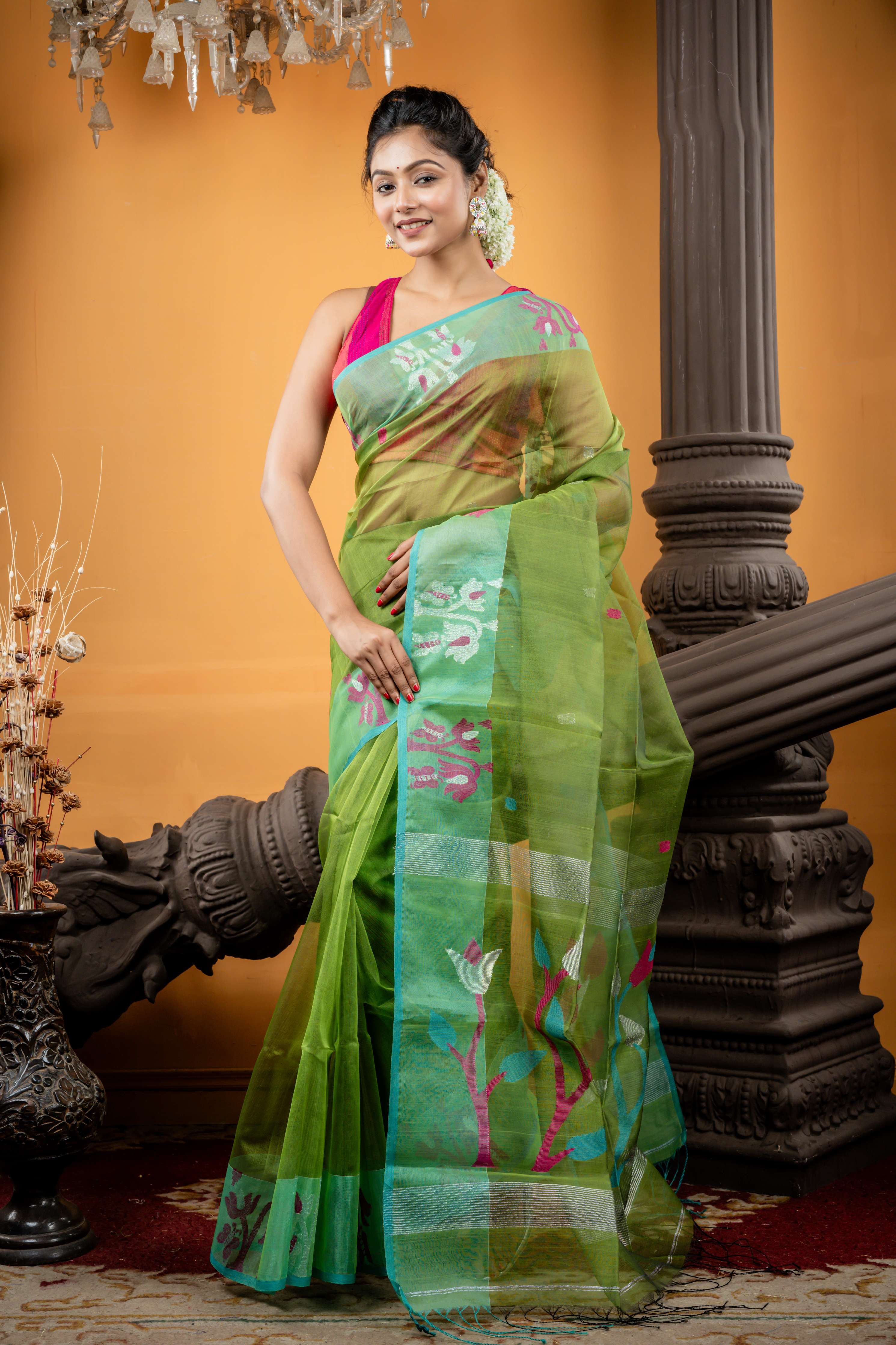 Triparna || Sap Green Premium Muslin Bengal Handloom Saree with all over Multi-colour & Silver Zari Buta and Parrot Green Jamdani Floral motif Border & Pallu