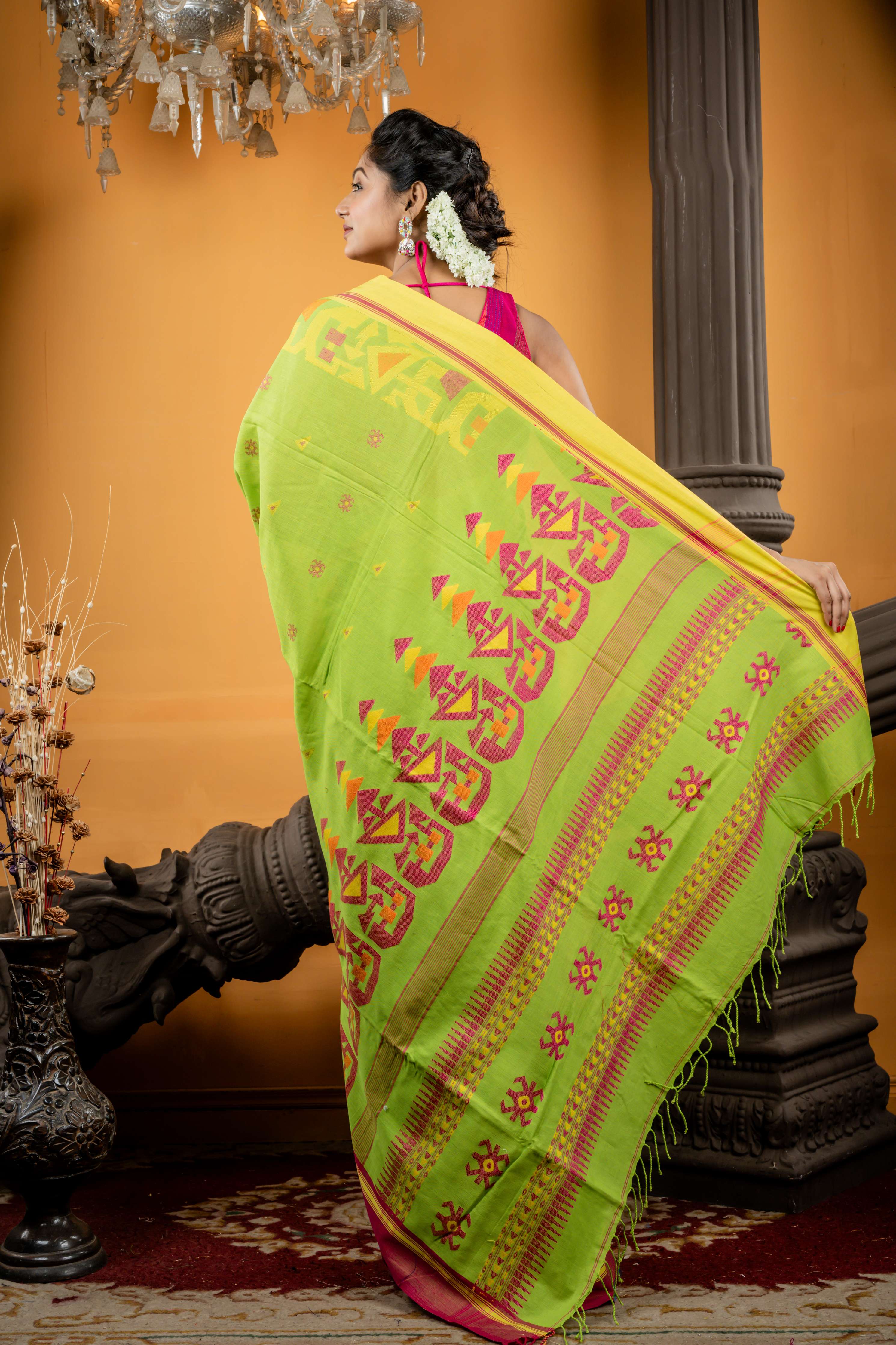 Tiya || Parrot Green Cotton Bengal Handloom Saree with all over Multi-colour Buti, Lemon Yellow & Magenta Pink 'Ganga Jamuna' Border and Traditional design Pallu