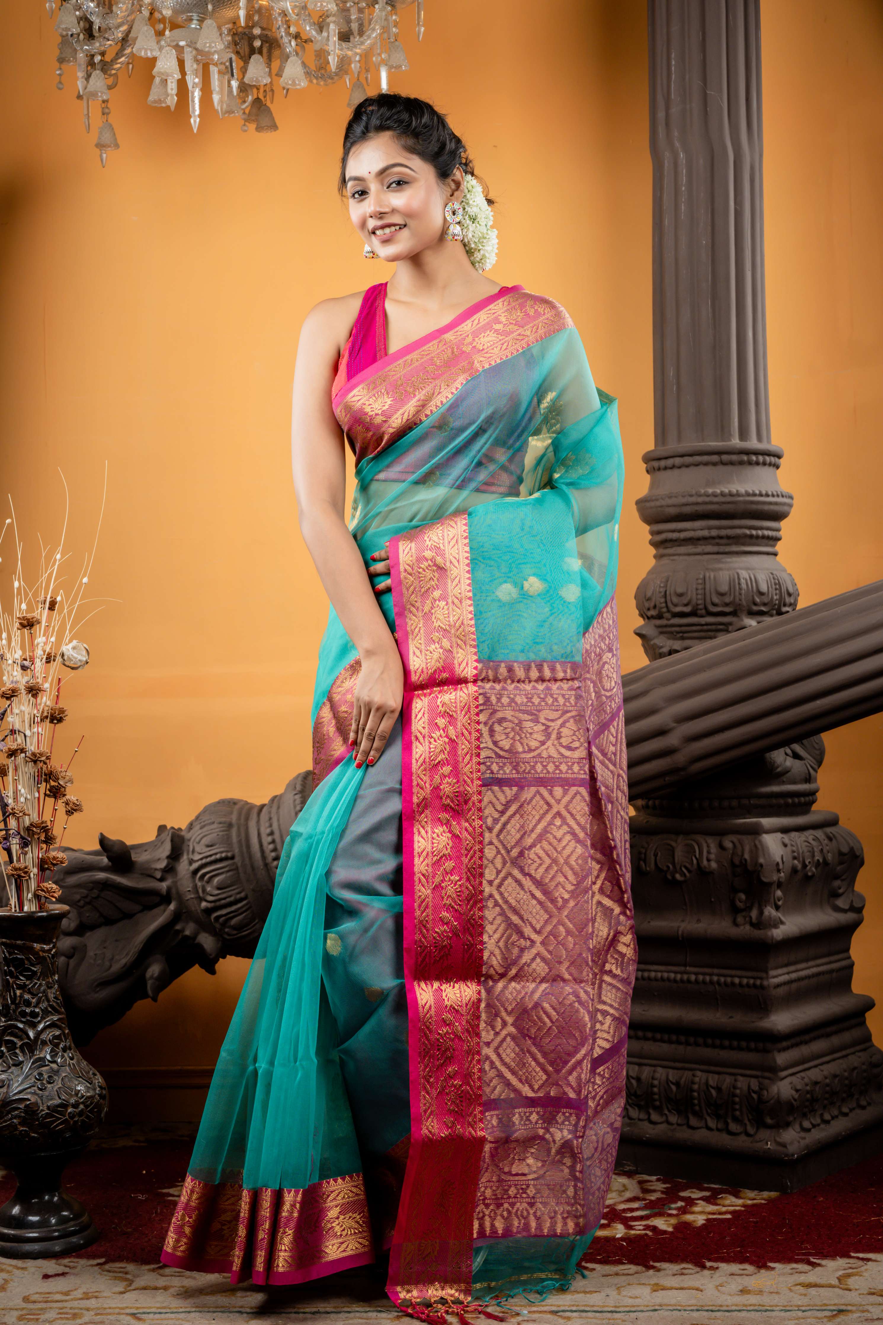 Ambalika || Teal Green Muslin Bengal Handloom Saree with all over Golden Zari Traditional Buta, Magenta Pink Border and dual tone Banarasi design Pallu