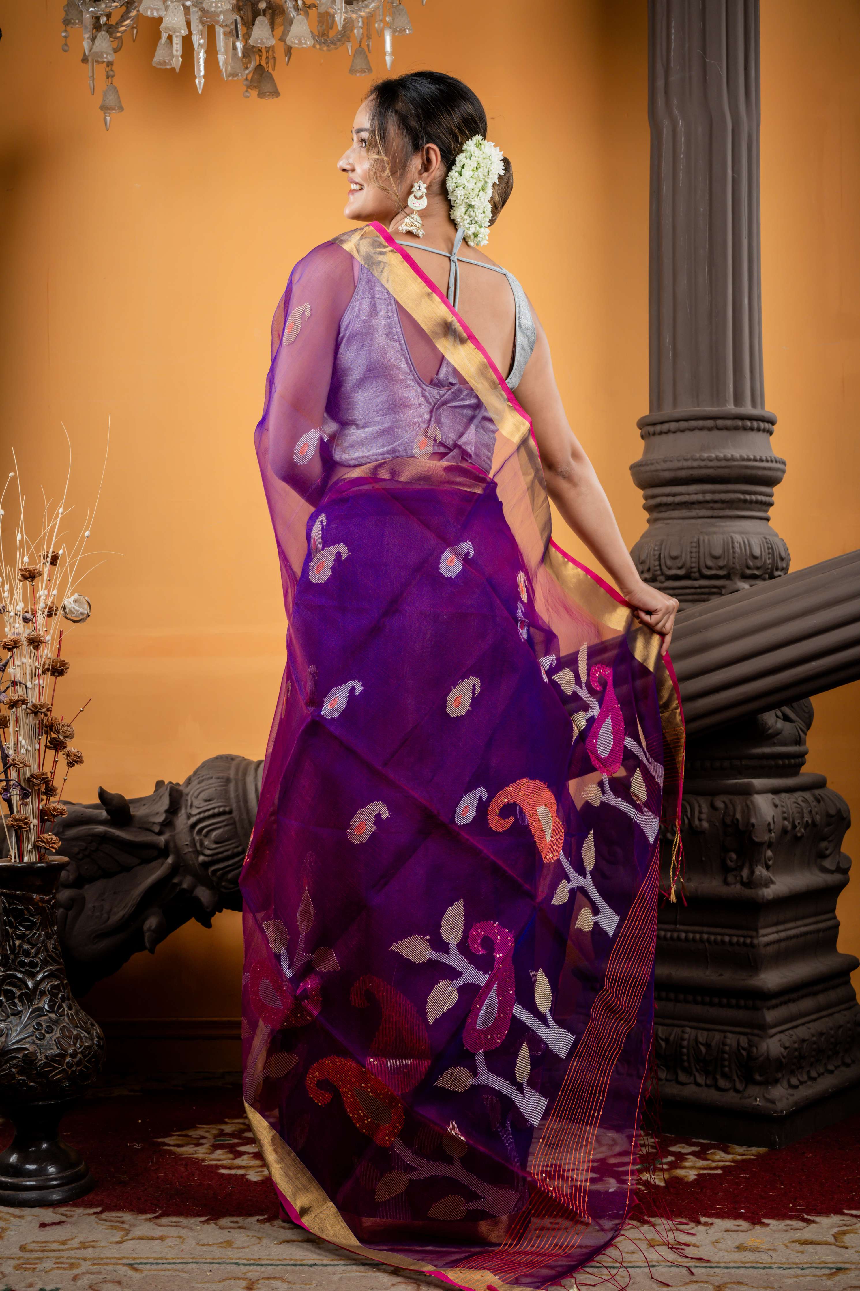 Mahua || Purple & Peacock Blue dual tone Premium Muslin Bengal Handloom Saree with all over Multi-colour Traditional 'Aam Kalka' motif Buta & Pallu and Sequins, Silver Zari & Gold Zari highlights