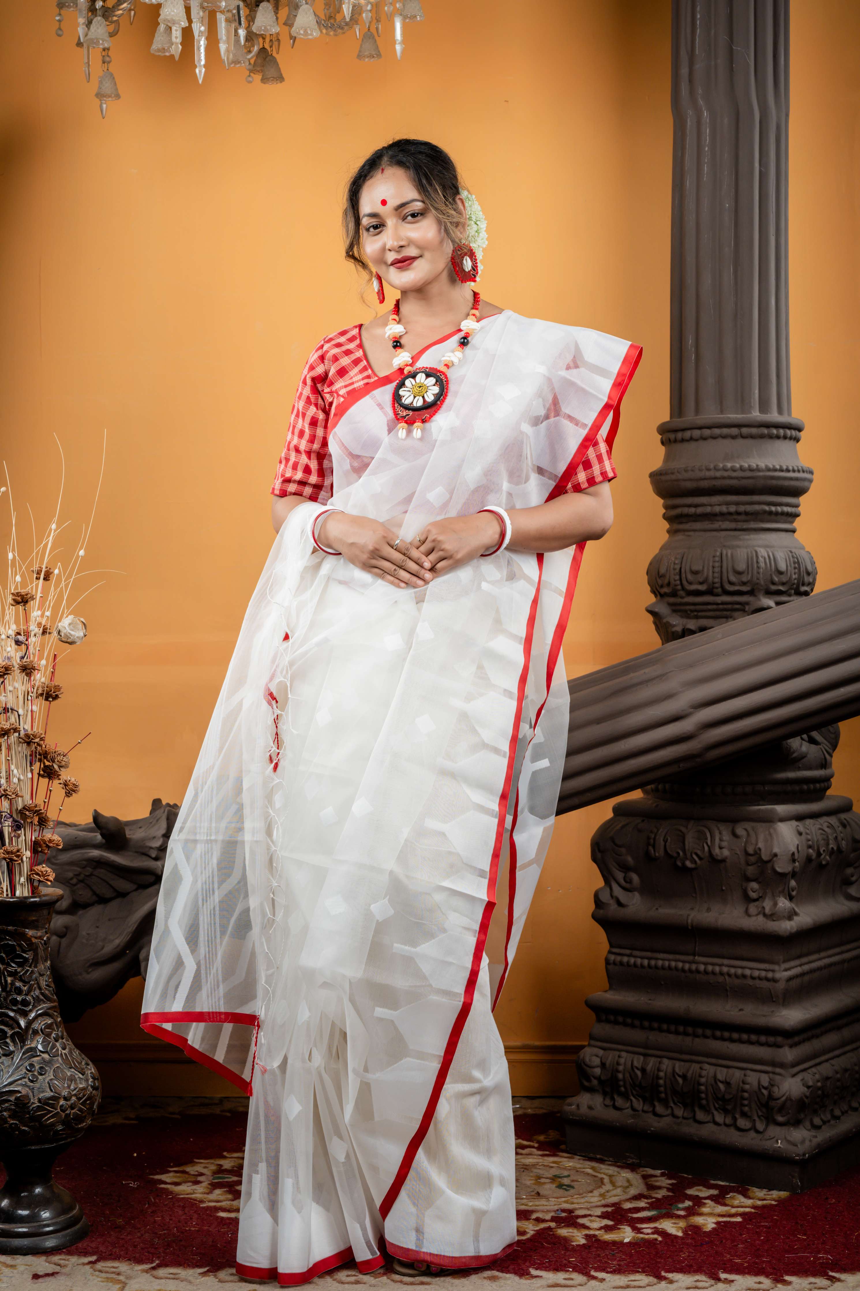 Shiuli || White Muslin Saree with all over White Resham Self Abstract Buta, ZigZag Stripe Pallu and Sleek Red Border with 'Temple' motifs