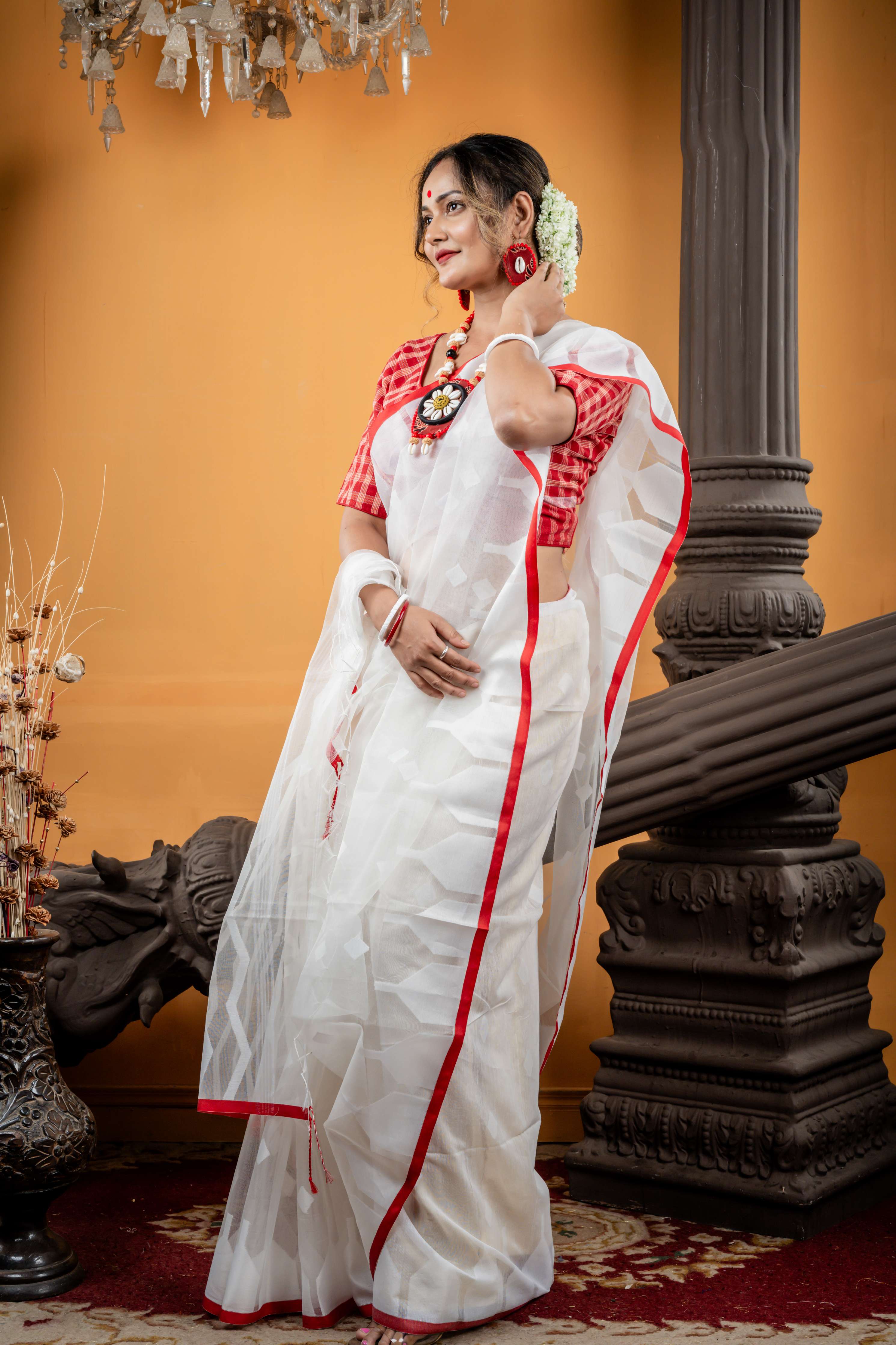 Shiuli || White Muslin Saree with all over White Resham Self Abstract Buta, ZigZag Stripe Pallu and Sleek Red Border with 'Temple' motifs