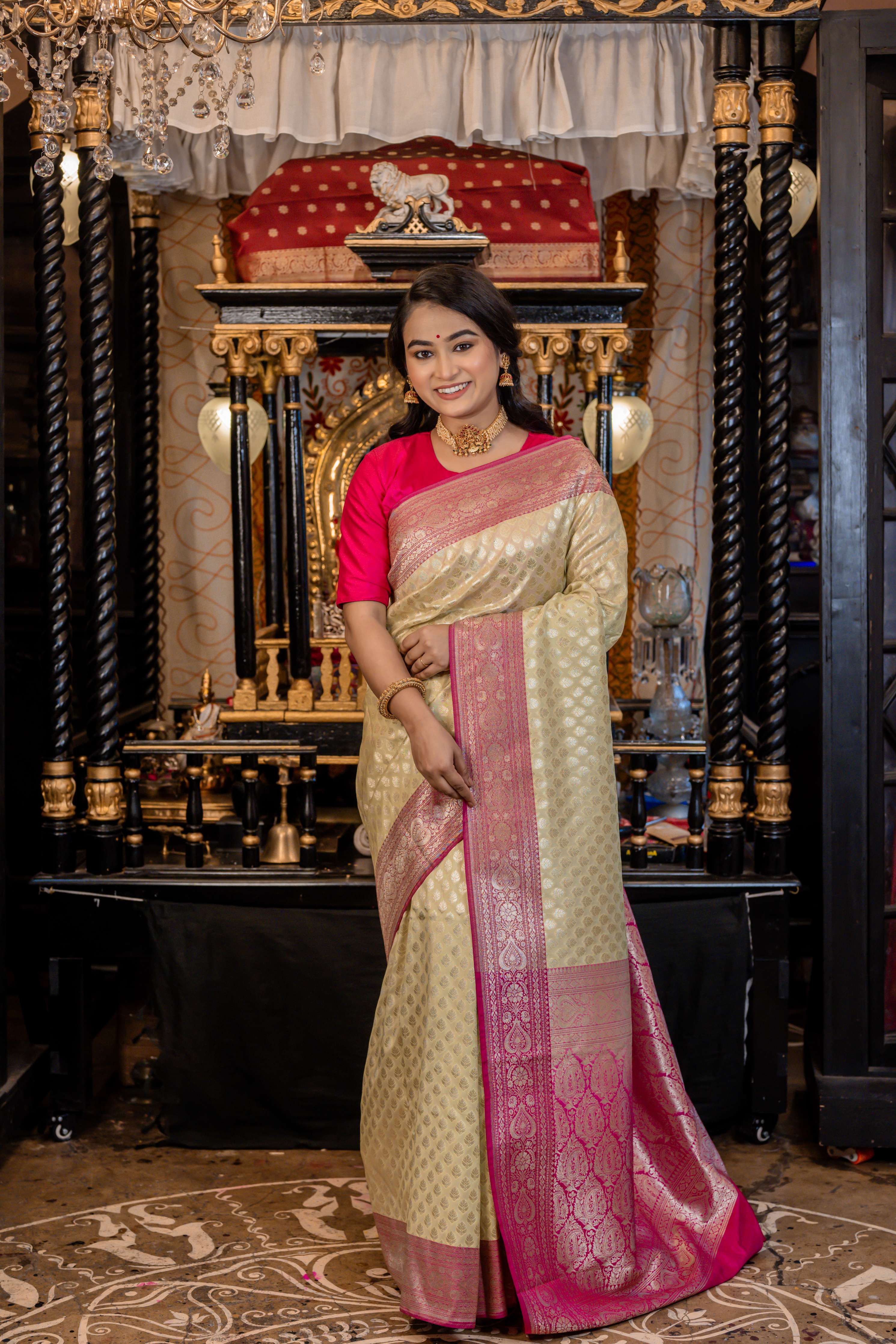 Vrishti || Light Pista Green Soft Katan Banarasi Saree with all over Matte Gold Zari Floral Buti and Magenta border