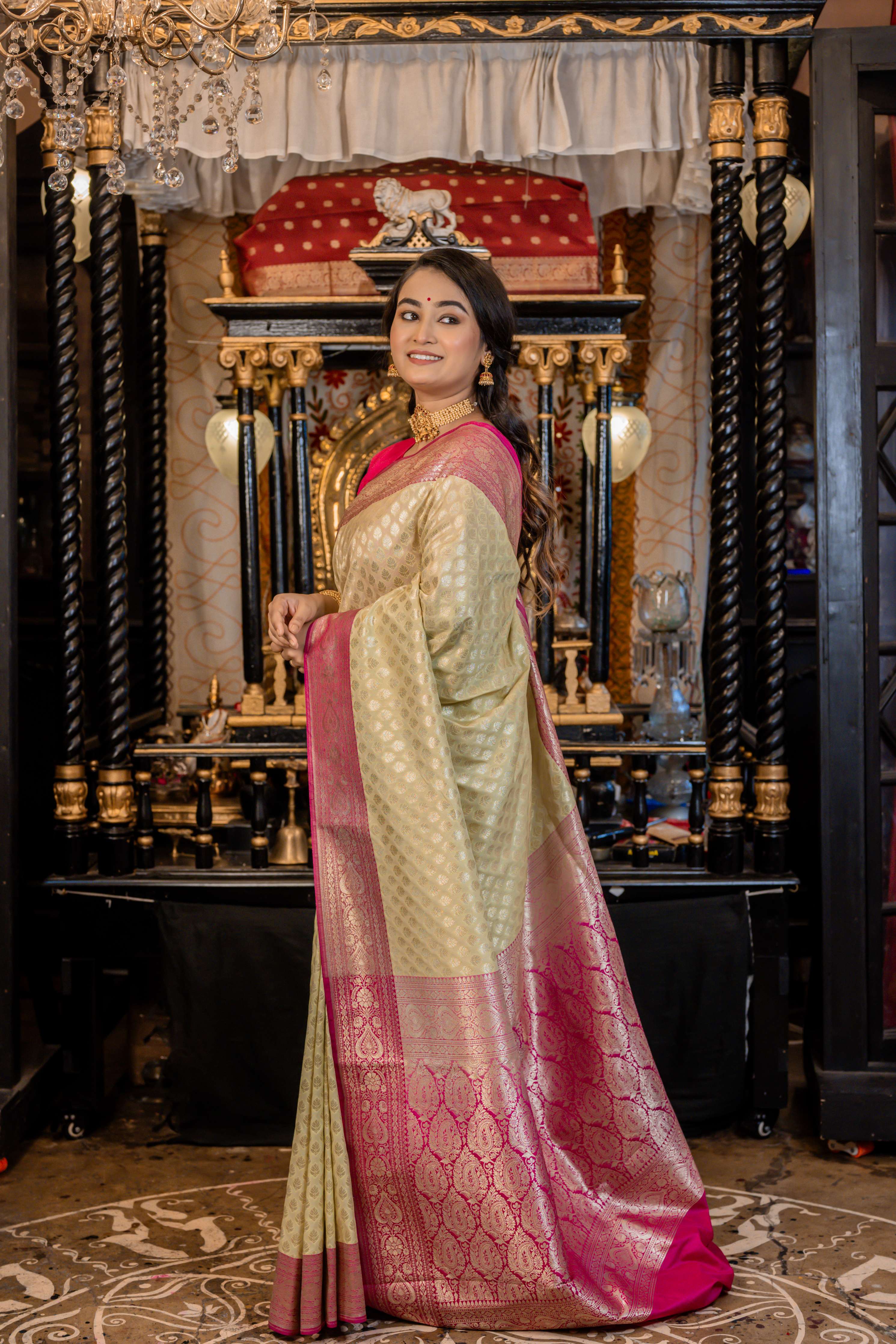 Vrishti || Light Pista Green Soft Katan Banarasi Saree with all over Matte Gold Zari Floral Buti and Magenta border