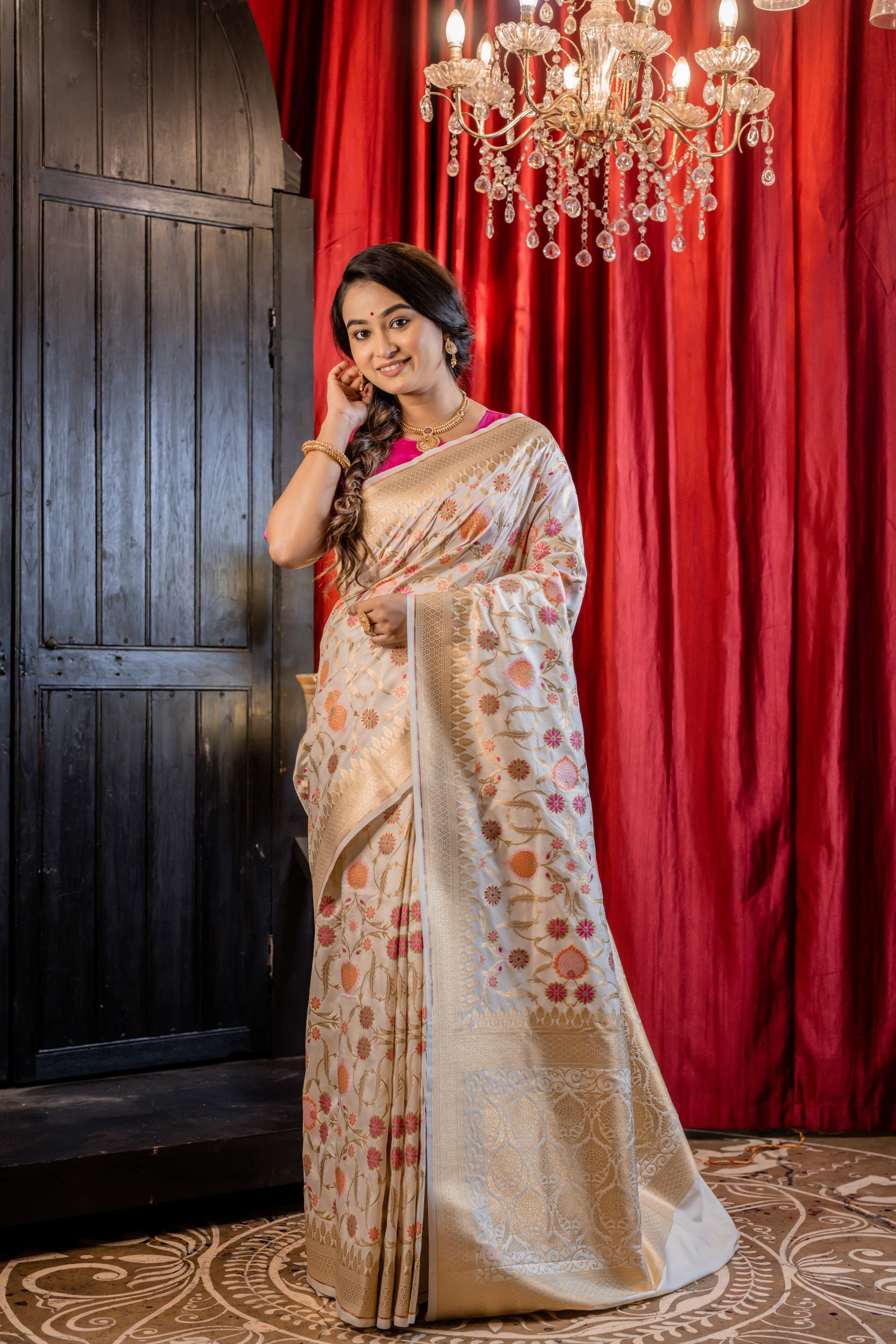 Bahar || Off-White Soft Katan Banarasi Saree with all over multi-colour Floral Jamawar design and Jaal in Golden Zari