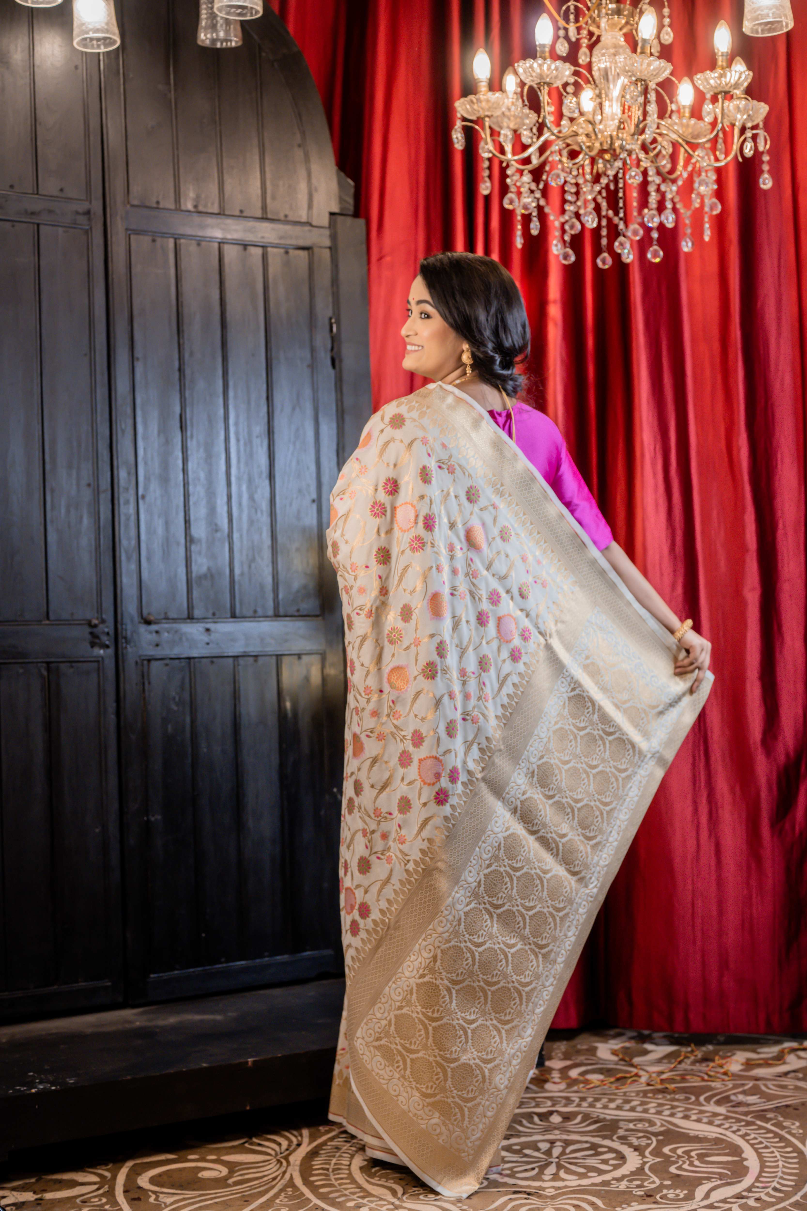 Bahar || Off-White Soft Katan Banarasi Saree with all over multi-colour Floral Jamawar design and Jaal in Golden Zari